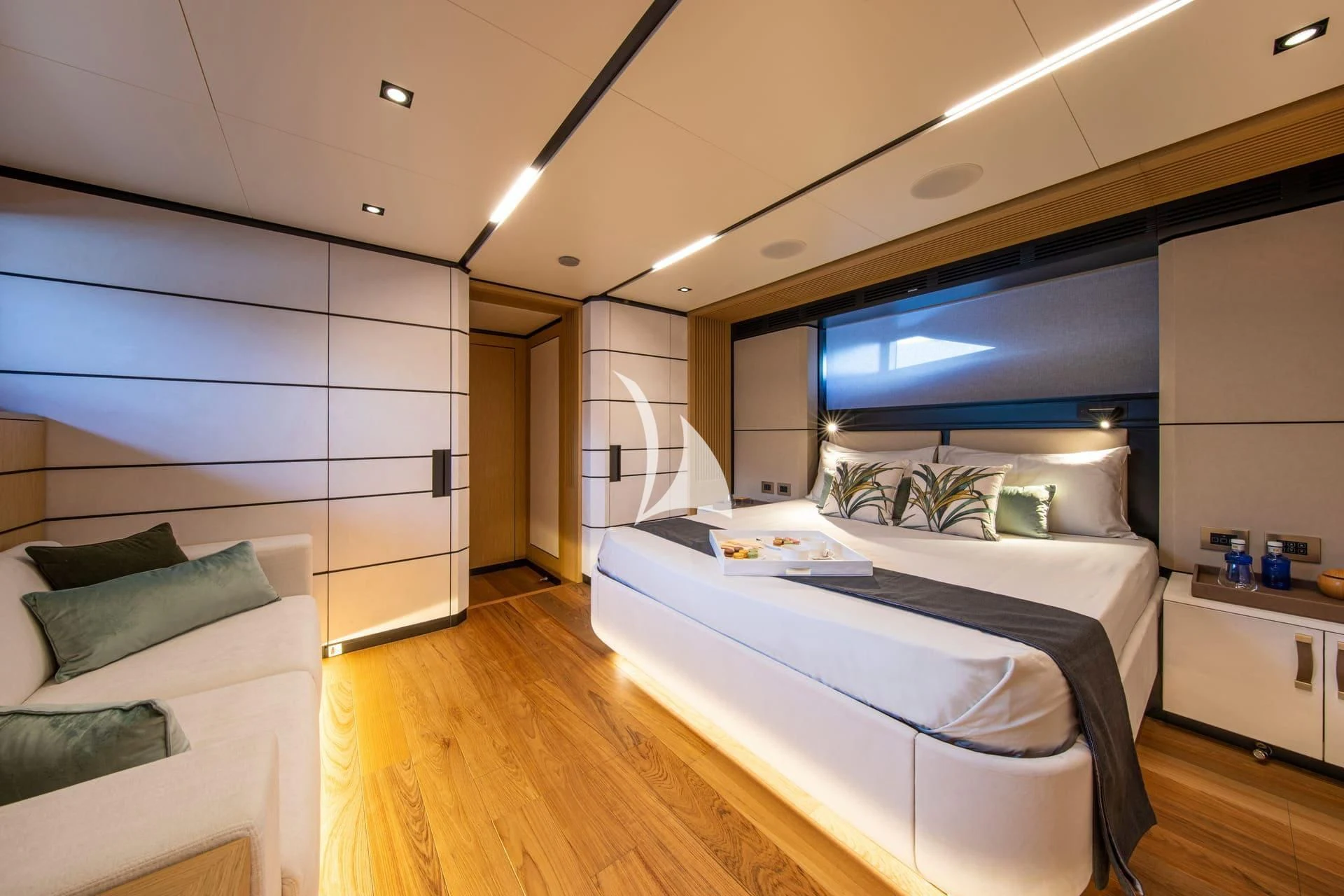 a room with a bed and a television aboard WHY 200 Yacht for Sale