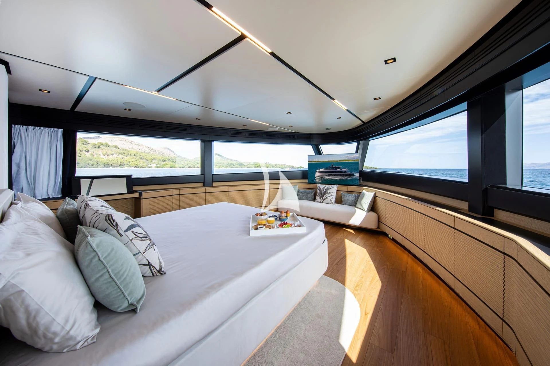 a room with a bed and a large window aboard WHY 200 Yacht for Sale