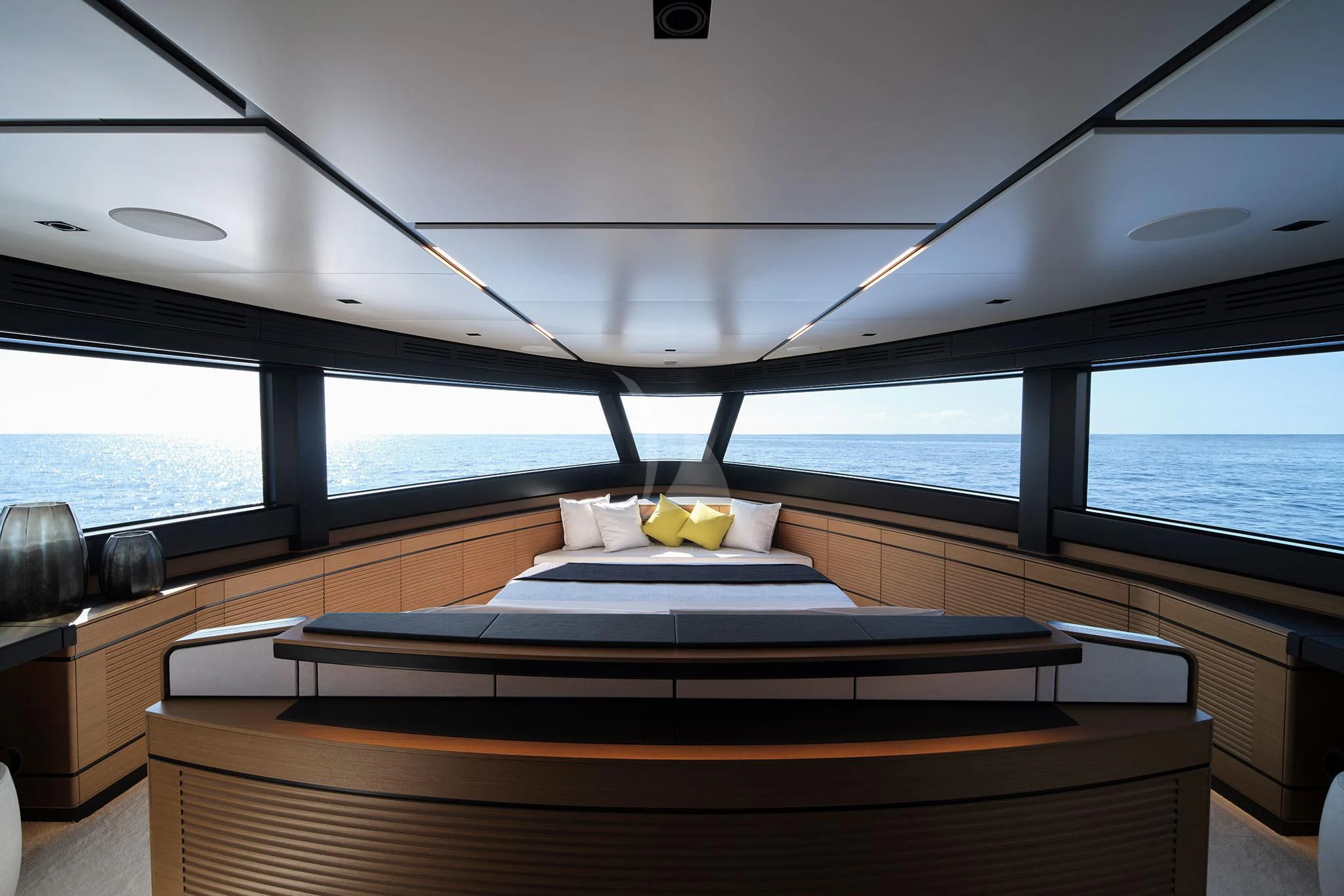 a room with a bed and a table with a yellow fruit on it aboard WHY 200 Yacht for Sale