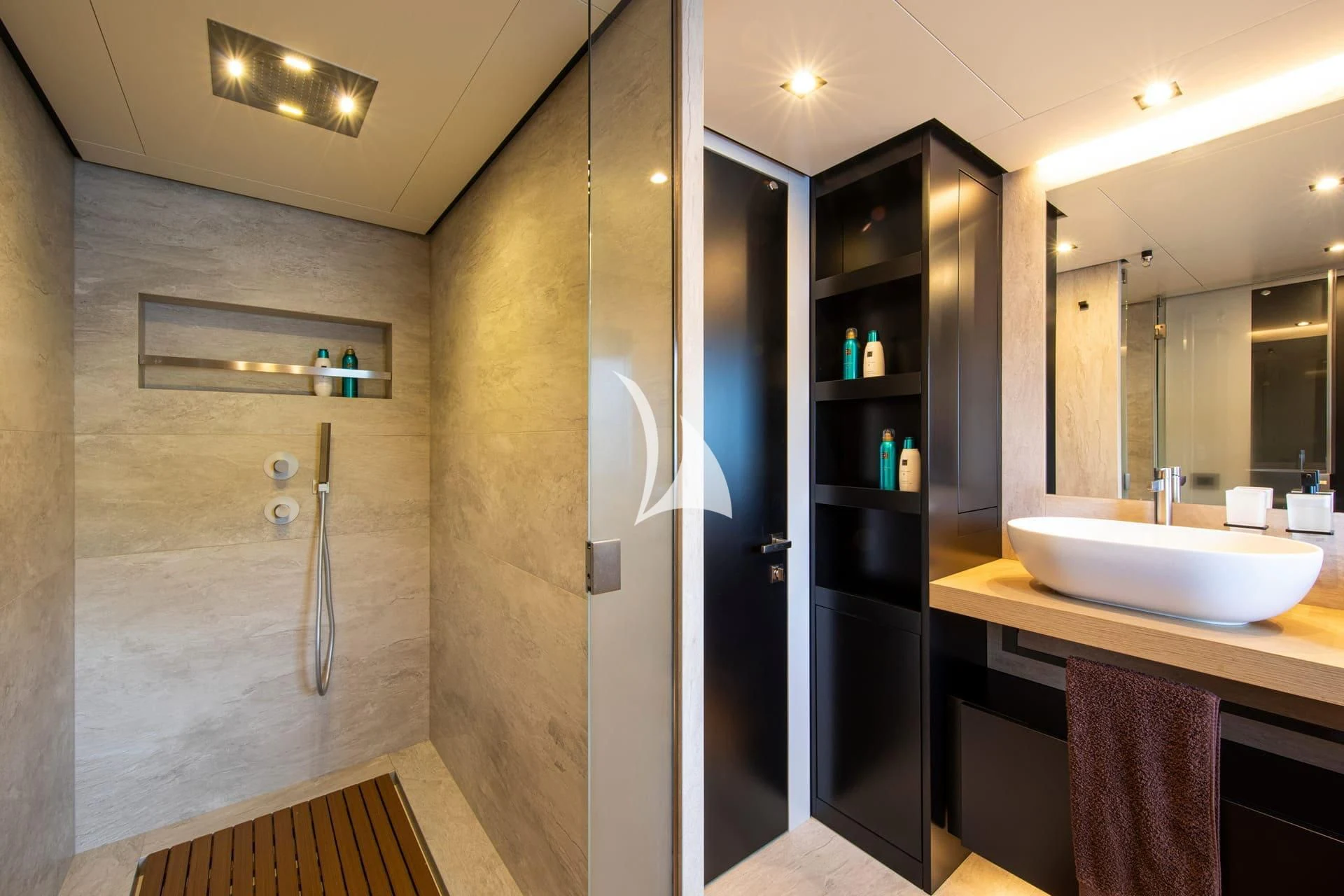 a bathroom with a shower unit and sink aboard WHY 200 Yacht for Sale