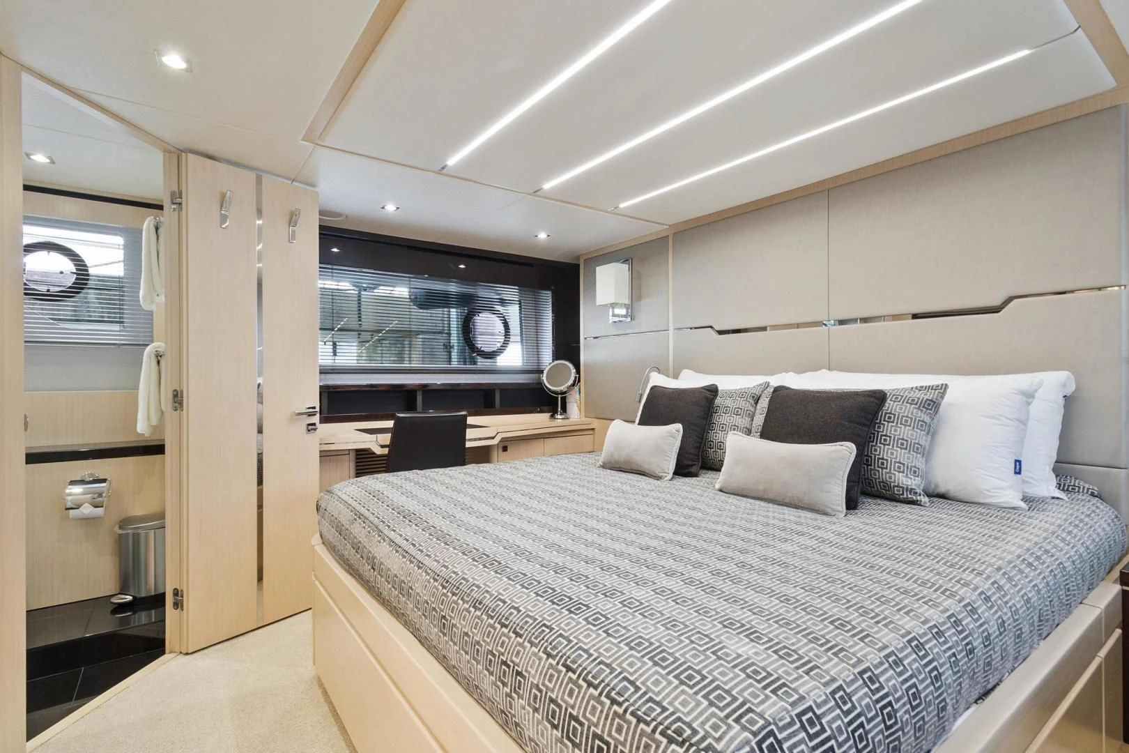 a bed in a room aboard JOLLY ROGERS Yacht for Sale