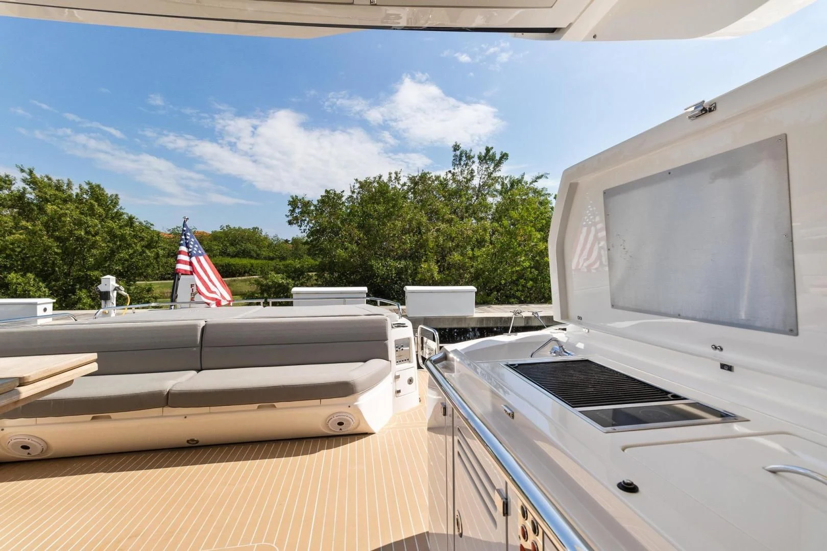 a deck with a flag on it aboard JOLLY ROGERS Yacht for Sale