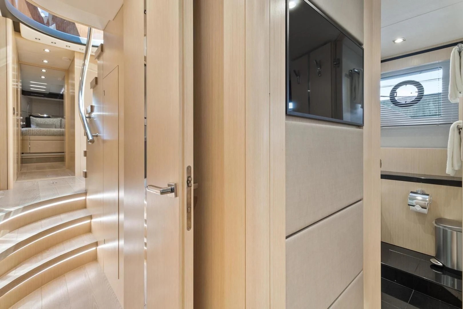 a bathroom with a glass shower aboard JOLLY ROGERS Yacht for Sale