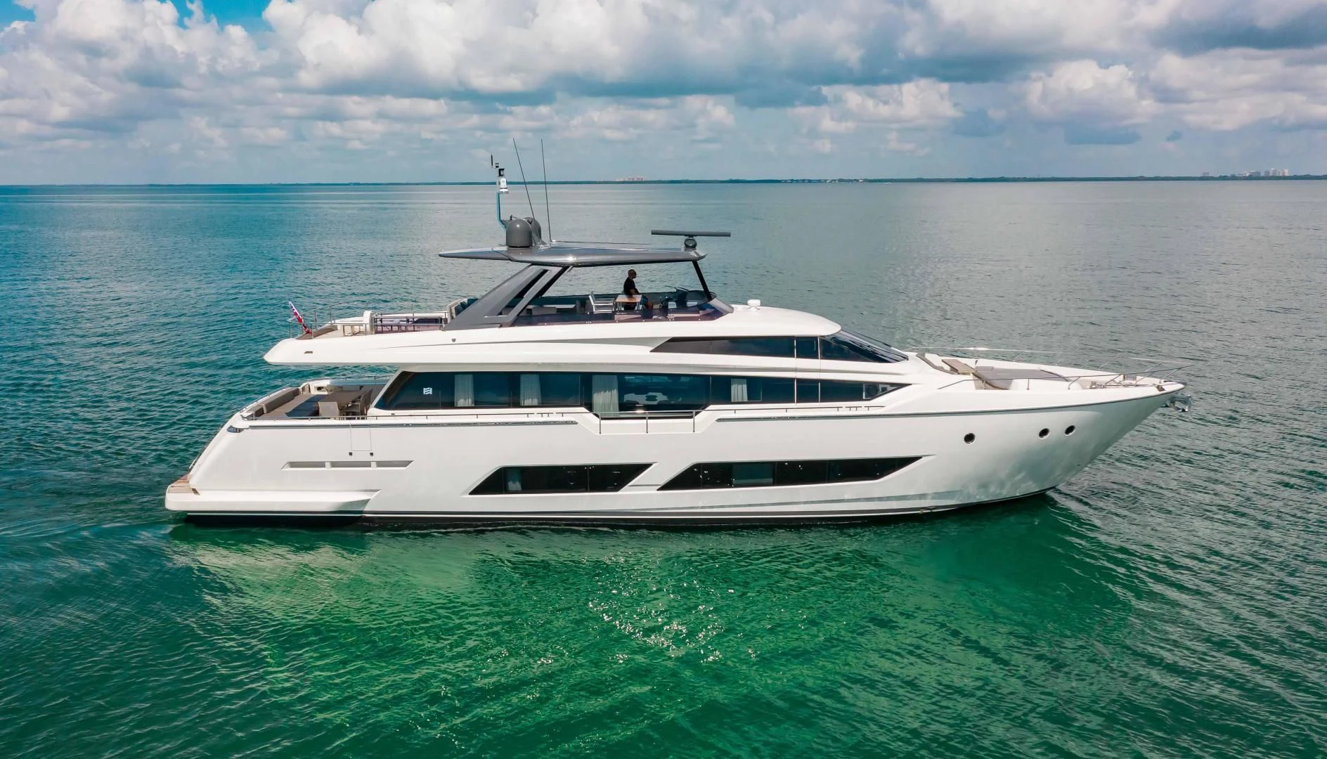 a white boat in the water aboard CRAZY Yacht for Sale