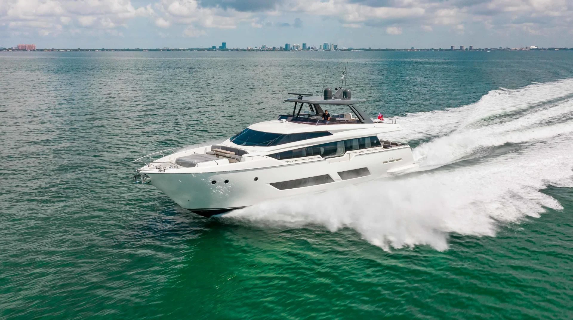 a white boat on the water aboard CRAZY Yacht for Sale