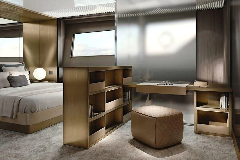 a room with a bed and a desk aboard CRAZY Yacht for Sale