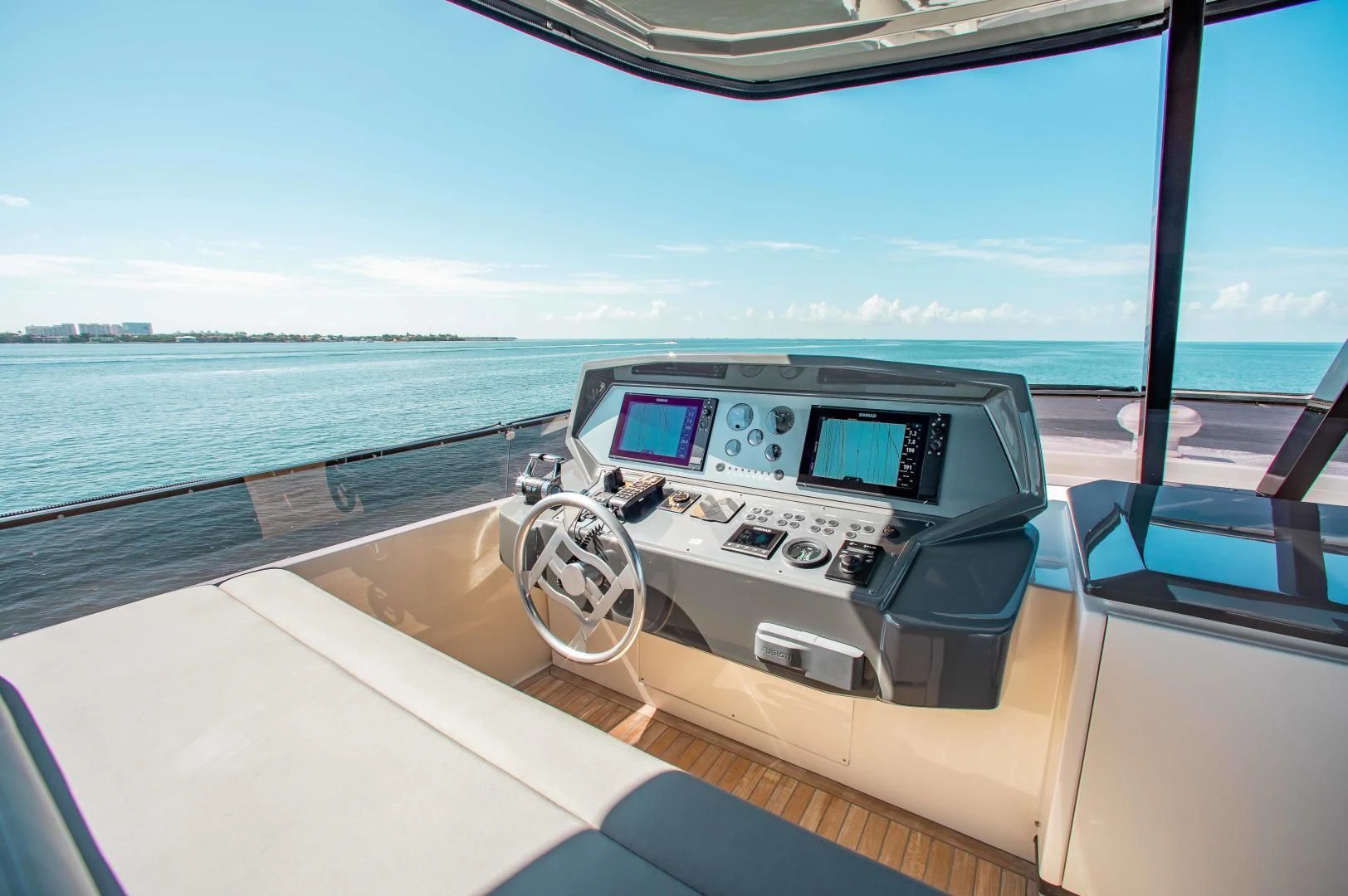 a car on a boat aboard CRAZY Yacht for Sale