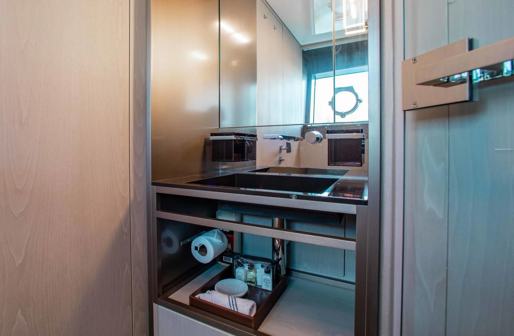 a kitchen with a sink and cabinets aboard CRAZY Yacht for Sale