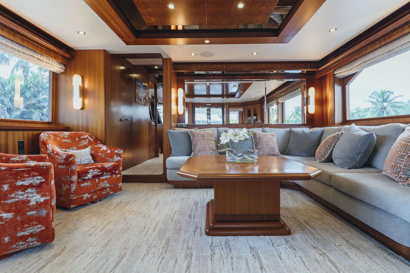 a living room with a couch and a coffee table aboard SKULLDUGGERY Yacht for Sale