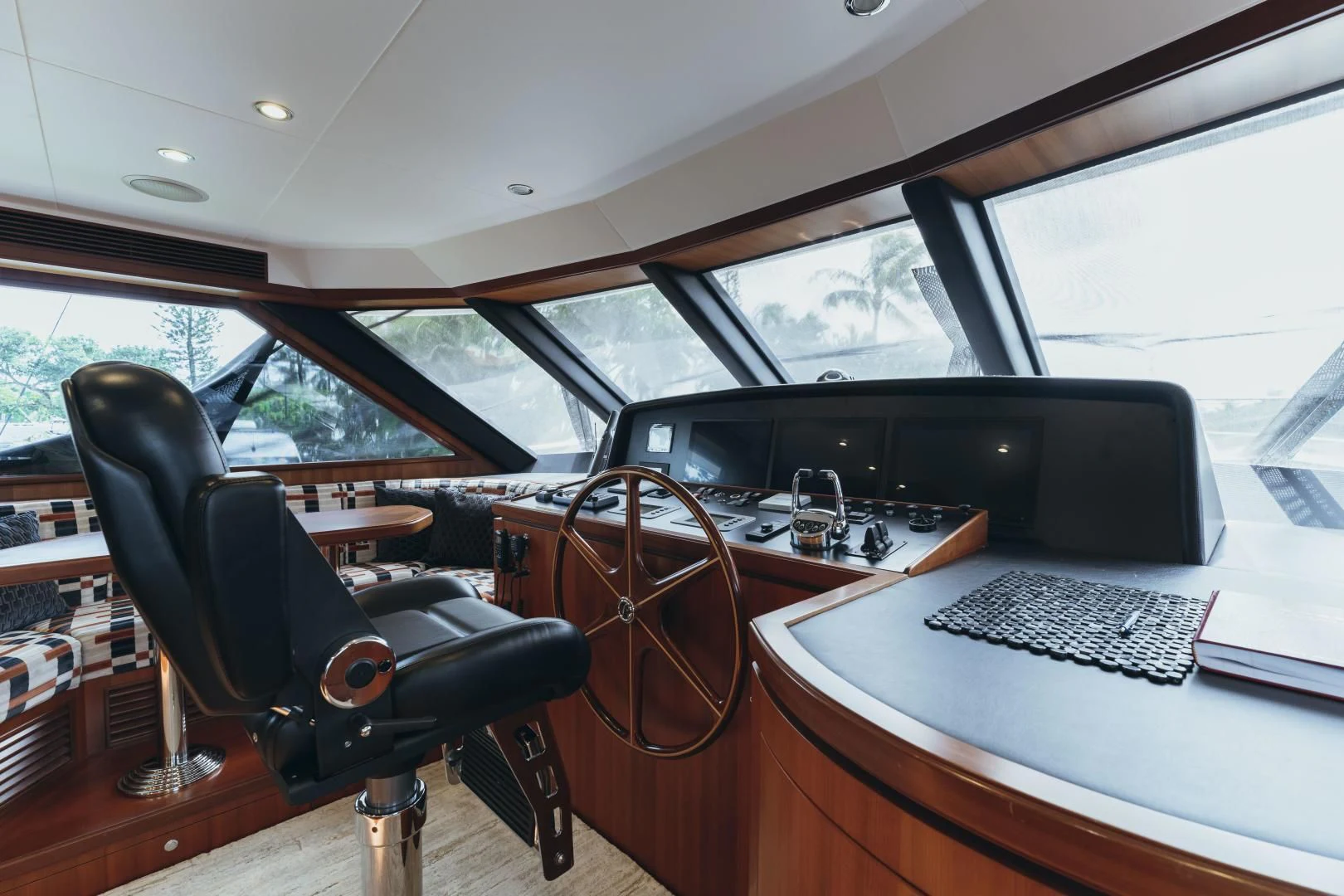 a car with a desk and a computer on it aboard SKULLDUGGERY Yacht for Sale