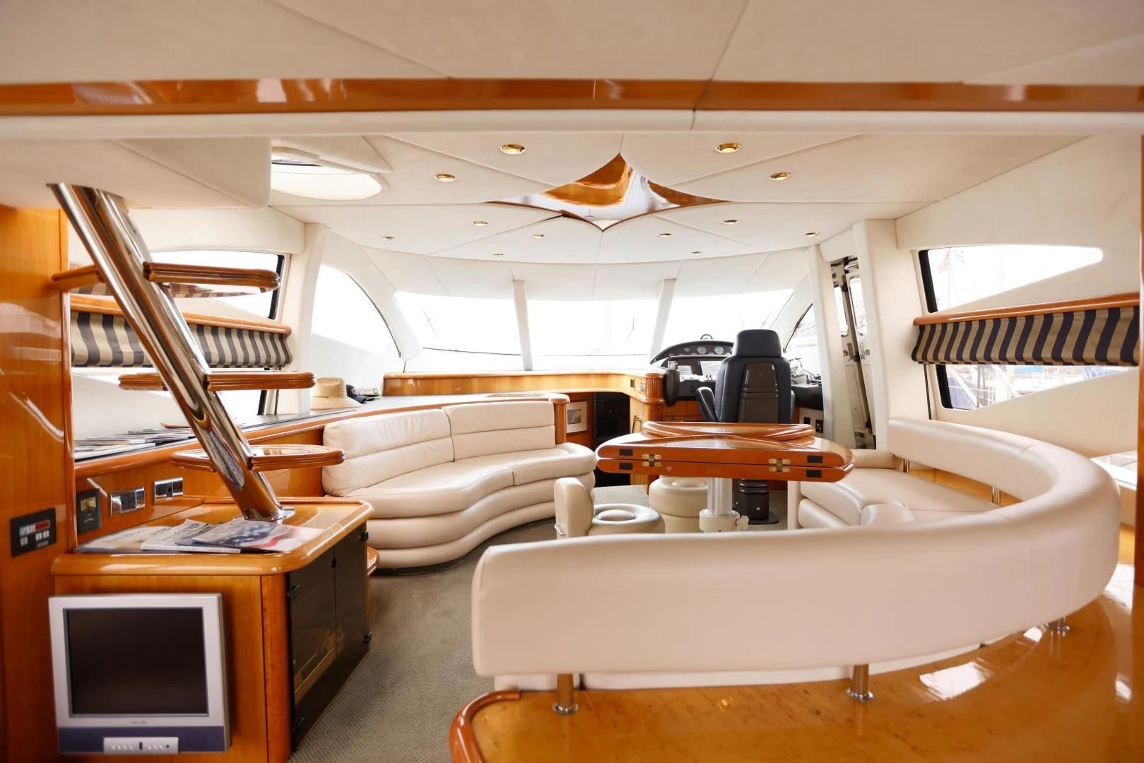 a room with a bed and a tv aboard DREAM BIG Yacht for Sale