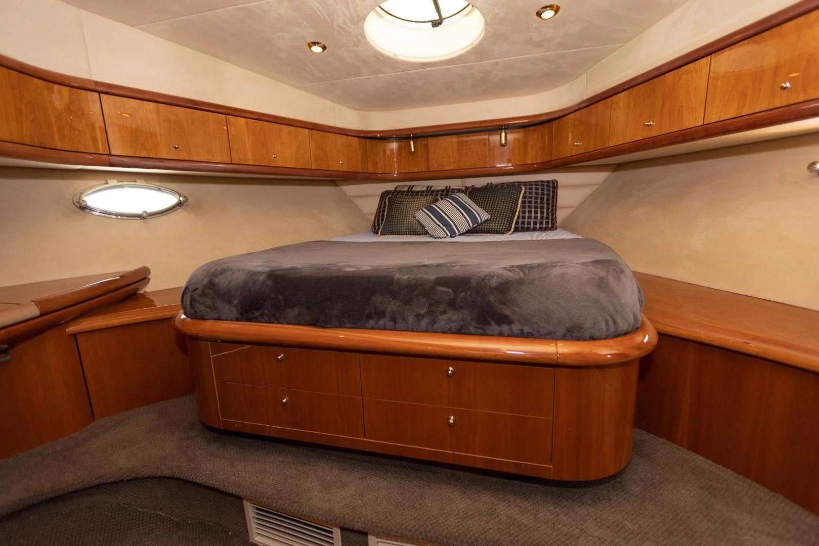 a bed in a room aboard DREAM BIG Yacht for Sale