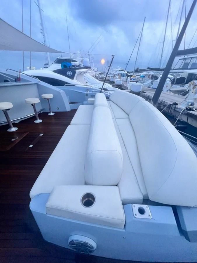 a deck with a deck and many boats on it aboard SUNSEEKER 84 Yacht for Sale