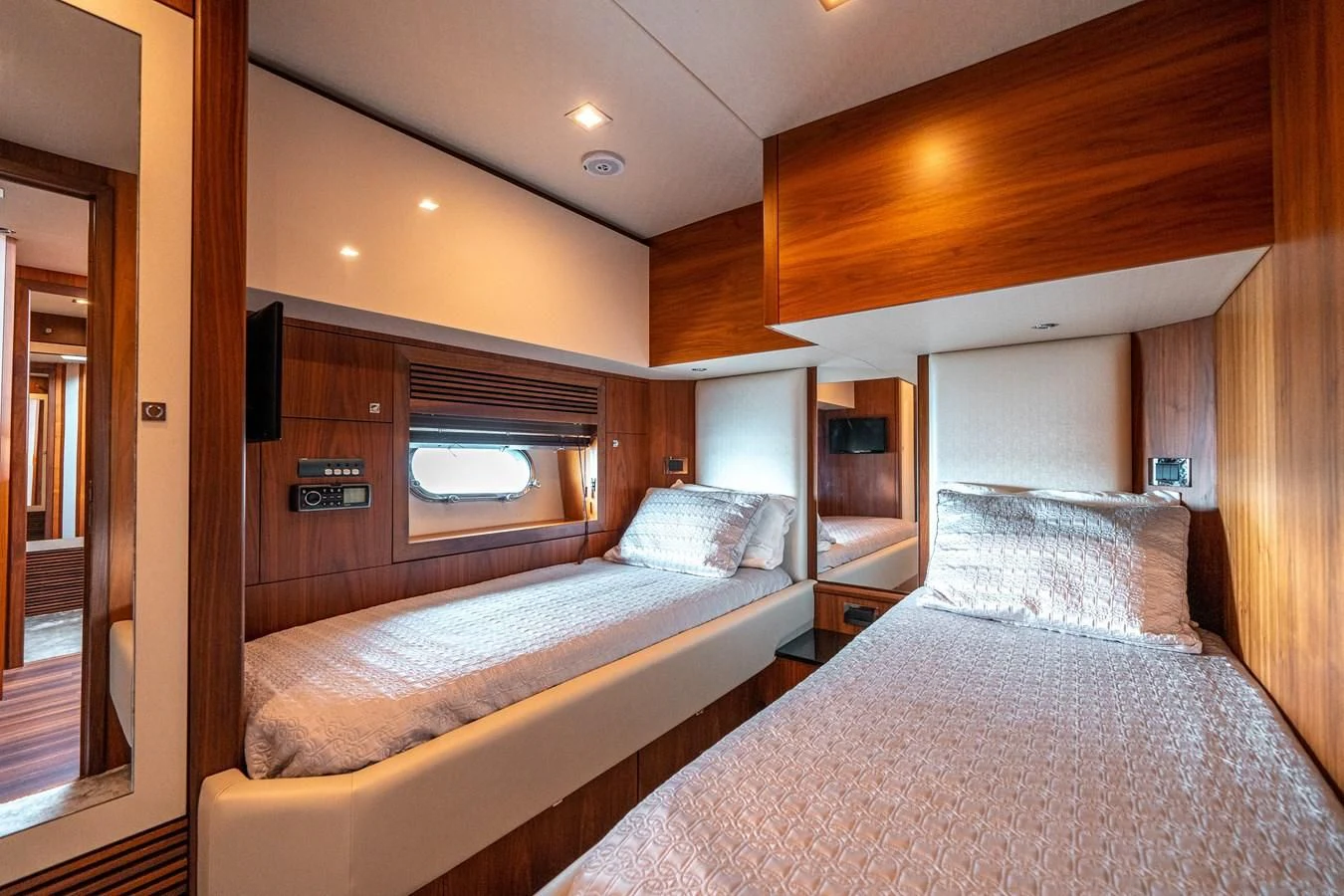 a bedroom with two beds aboard SUNSEEKER 84 Yacht for Sale