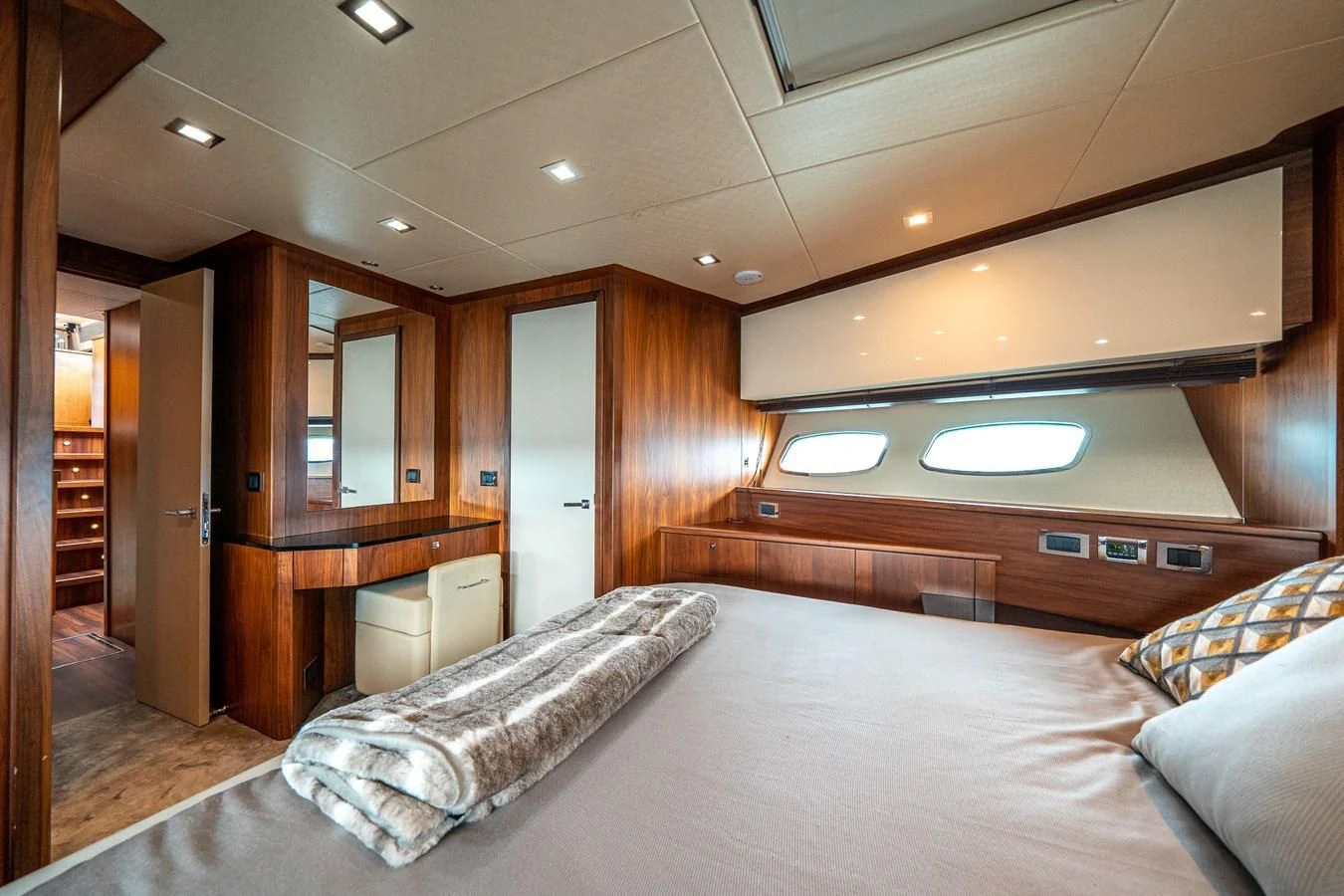 a large bed in a room aboard SUNSEEKER 84 Yacht for Sale