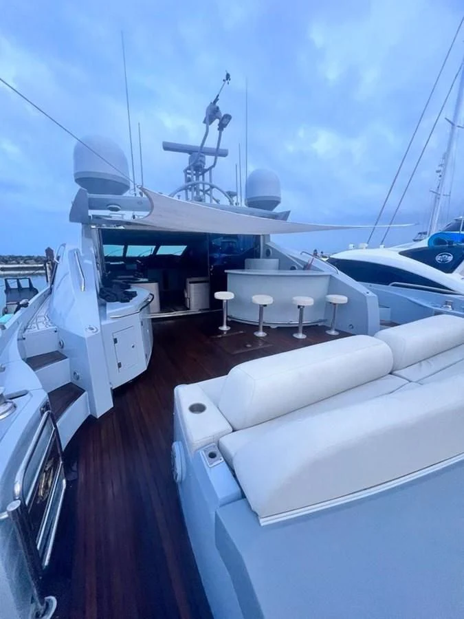 a deck with a deck and a boat on it aboard SUNSEEKER 84 Yacht for Sale