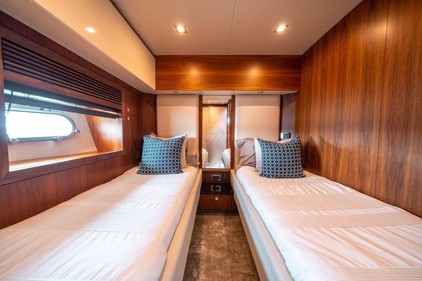 a room with two beds aboard SUNSEEKER 84 Yacht for Sale