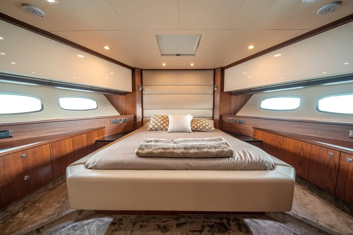 a bed in a room aboard SUNSEEKER 84 Yacht for Sale