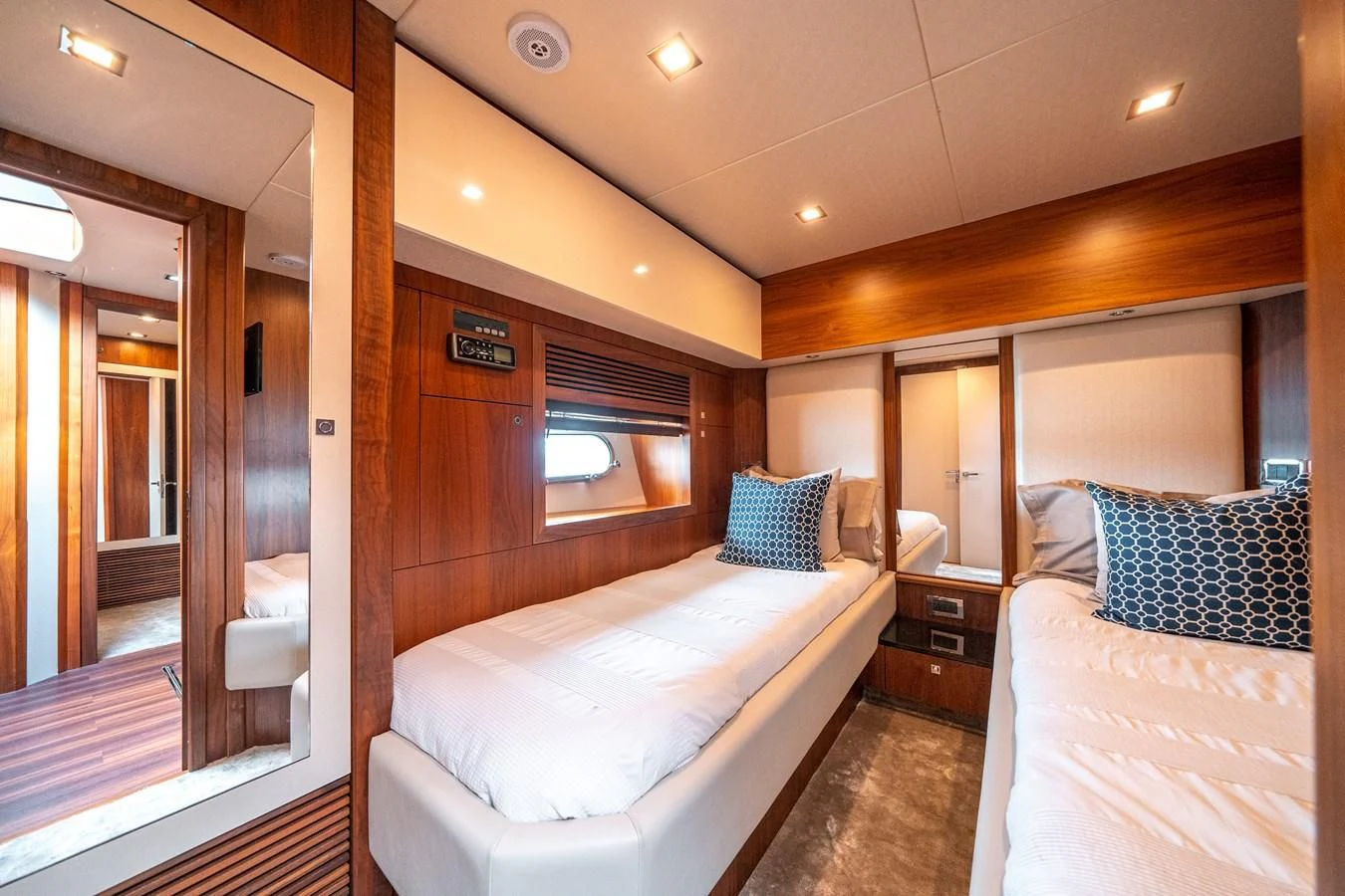 a room with two beds aboard SUNSEEKER 84 Yacht for Sale