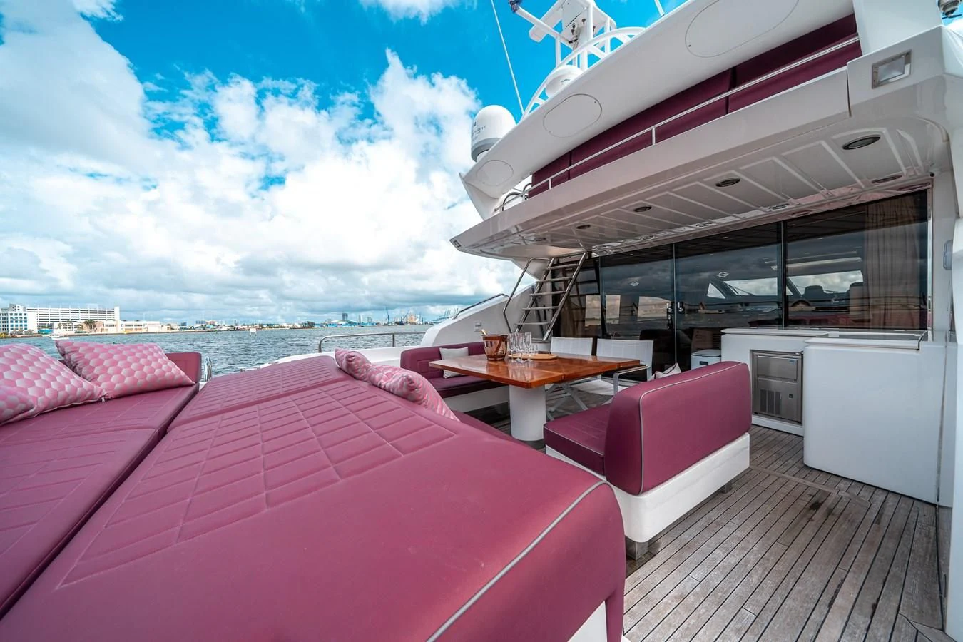 a room with a table and chairs aboard SUNSEEKER 84 Yacht for Sale