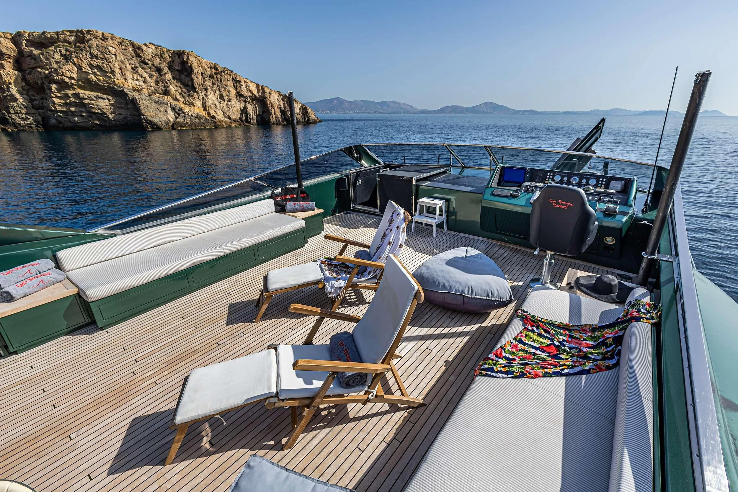 a deck with chairs and tables on it aboard CAN'T REMEMBER Yacht for Sale