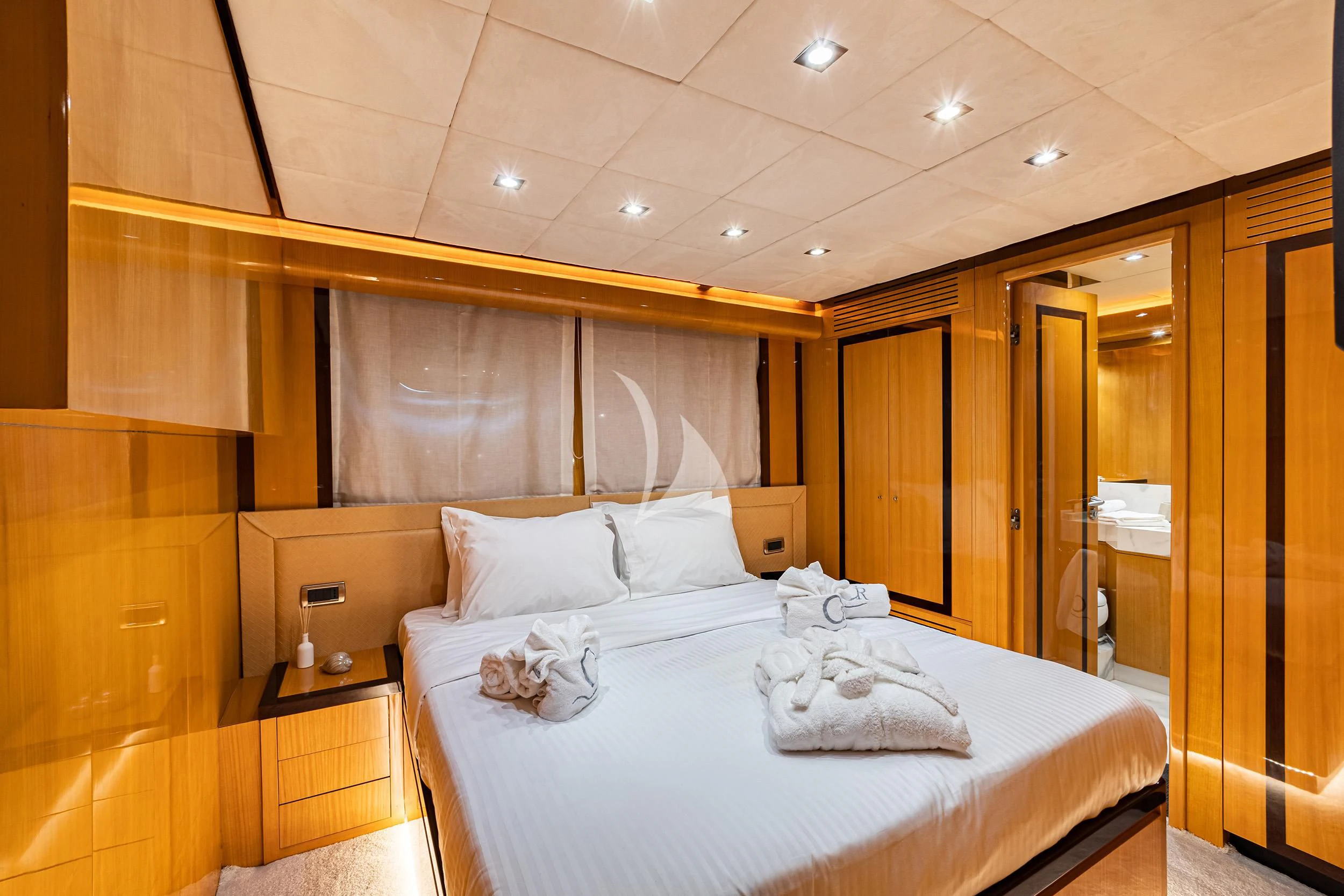a room with a bed and a mirror aboard CAN'T REMEMBER Yacht for Sale