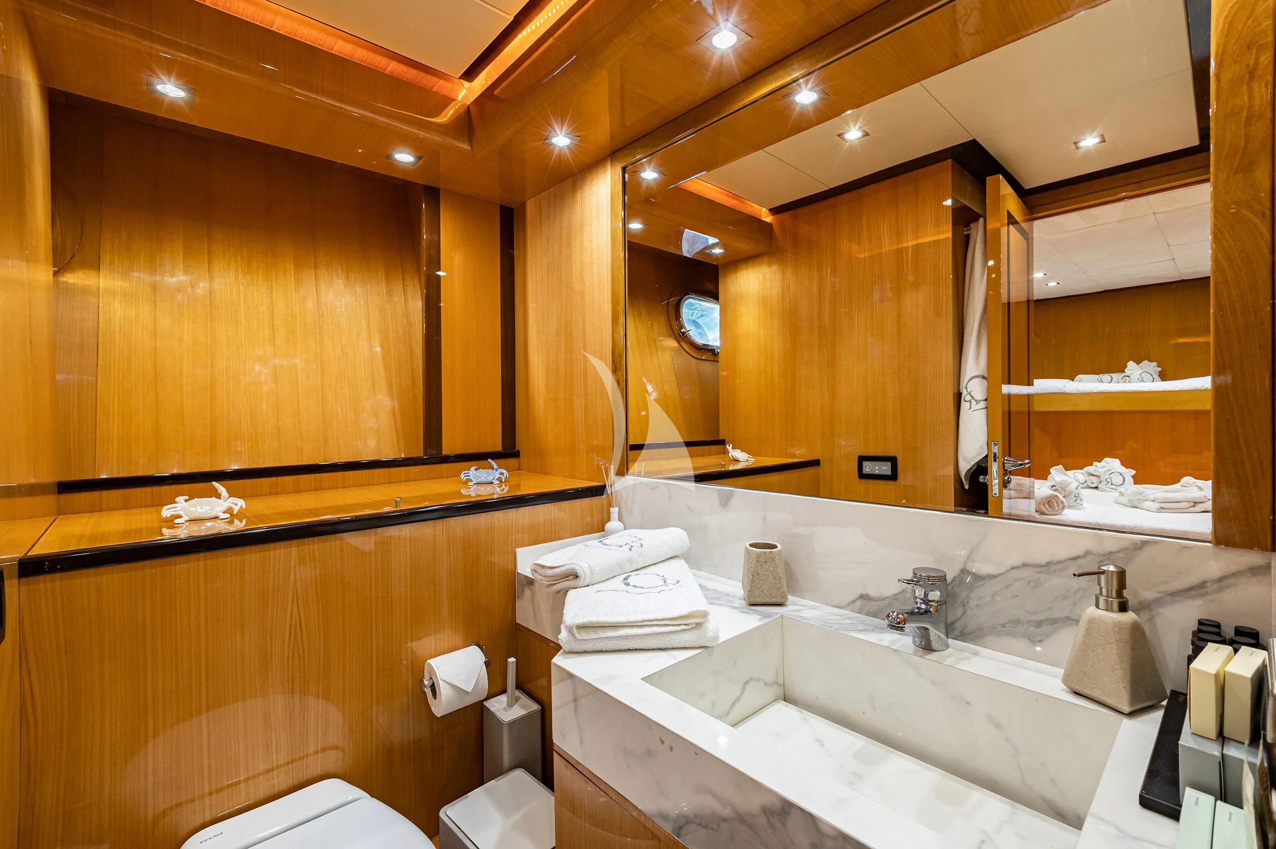 a bathroom with a large mirror aboard CAN'T REMEMBER Yacht for Sale