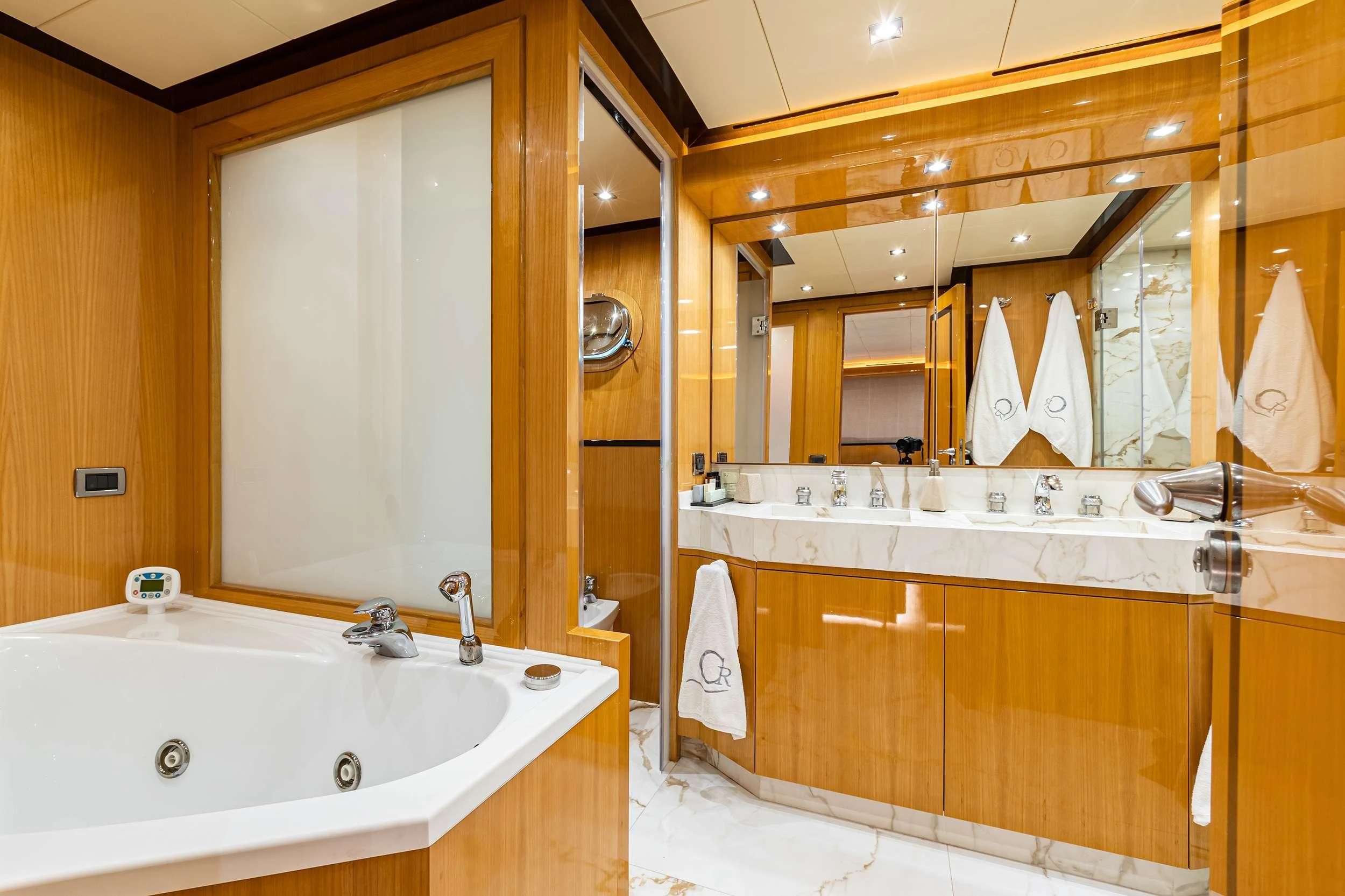 a bathroom with a large mirror aboard CAN'T REMEMBER Yacht for Sale