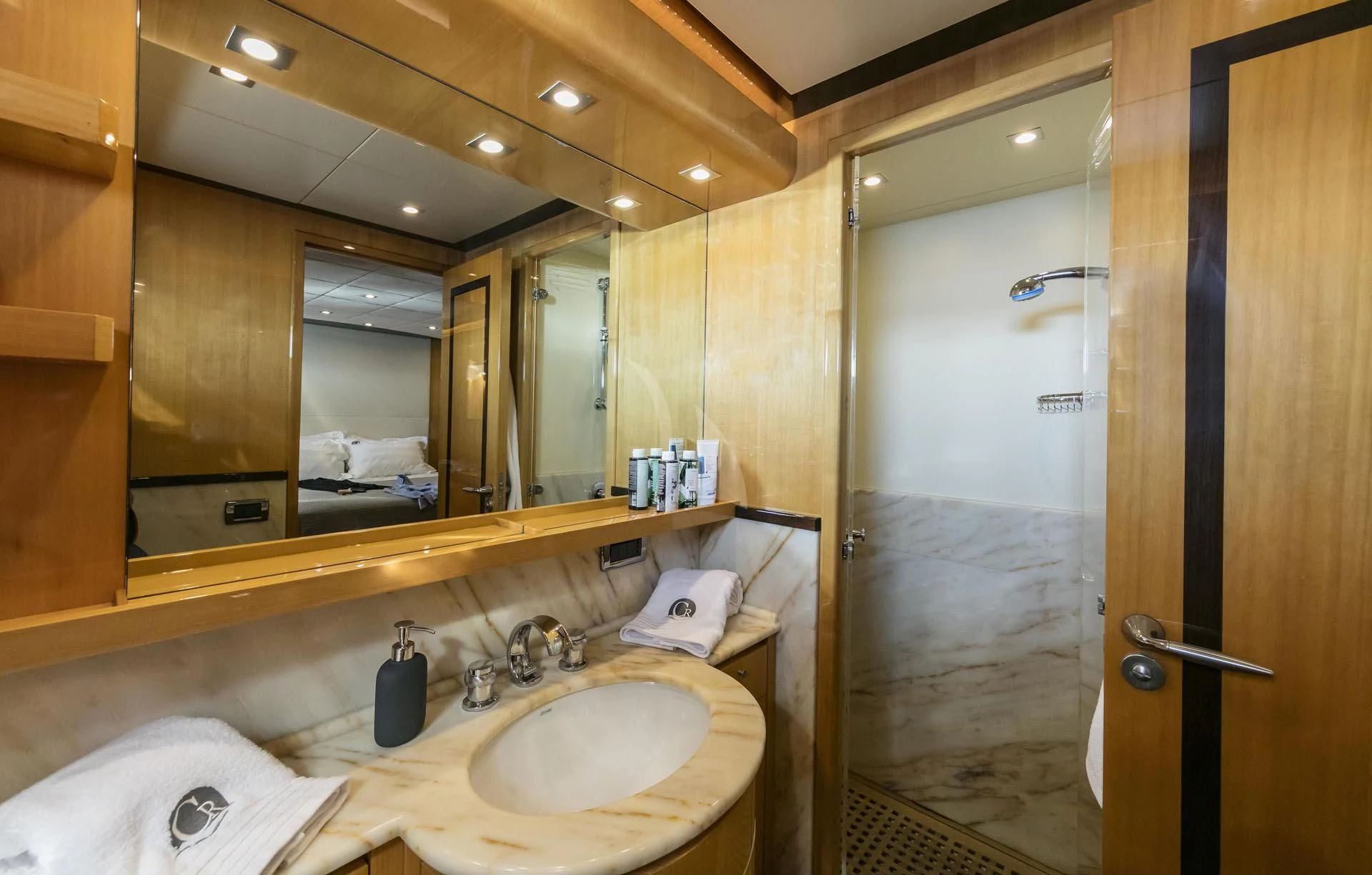 a bathroom with a large mirror aboard CAN'T REMEMBER Yacht for Sale