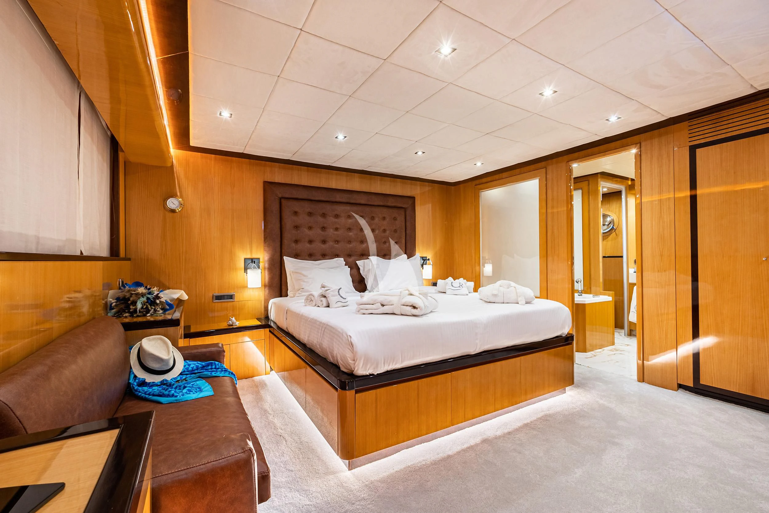 a room with a bed and a couch aboard CAN'T REMEMBER Yacht for Sale
