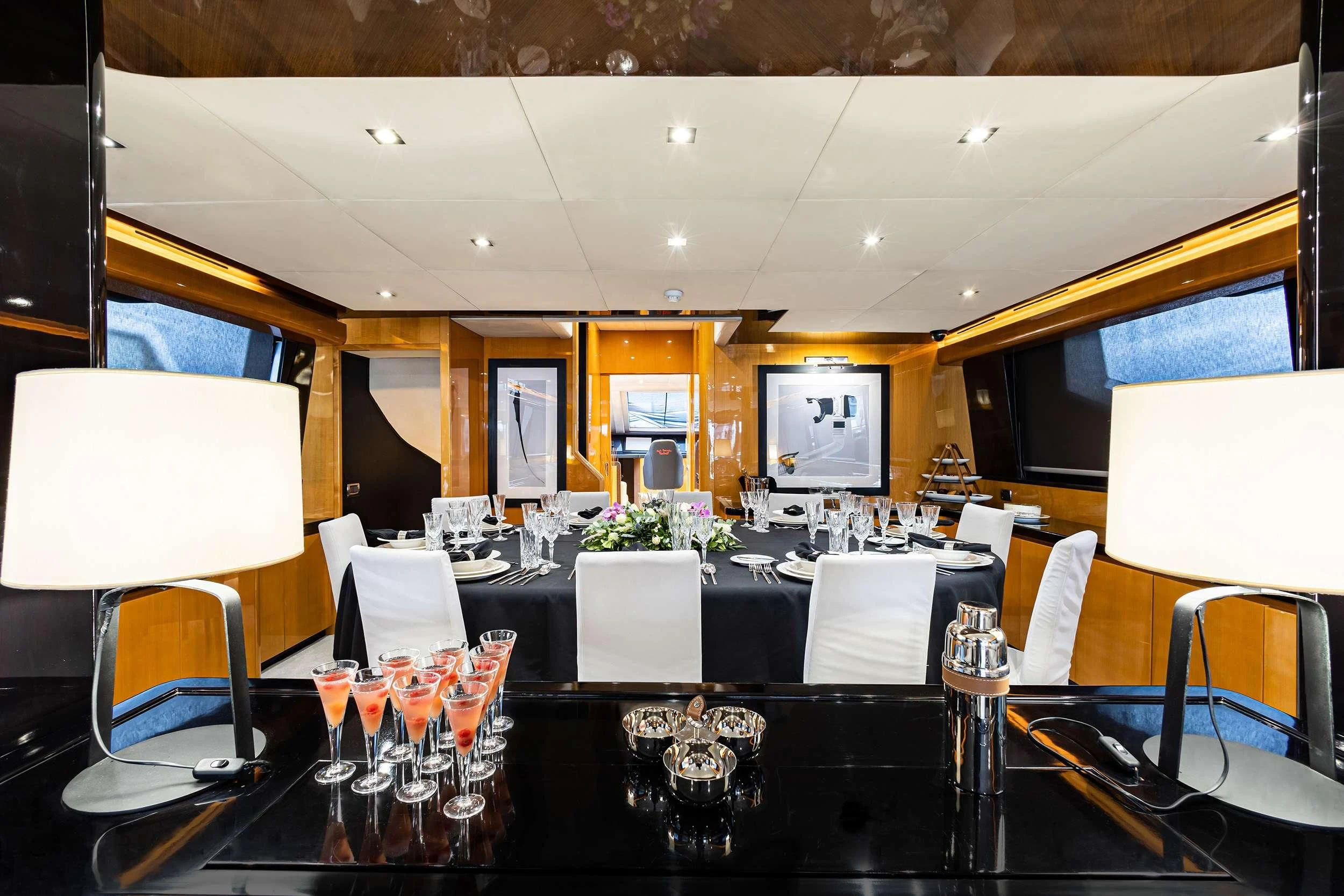 a large table with many wine glasses aboard CAN'T REMEMBER Yacht for Sale
