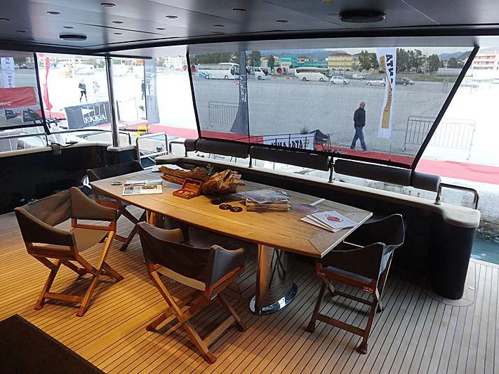 a table with chairs around it aboard CAN'T REMEMBER Yacht for Sale