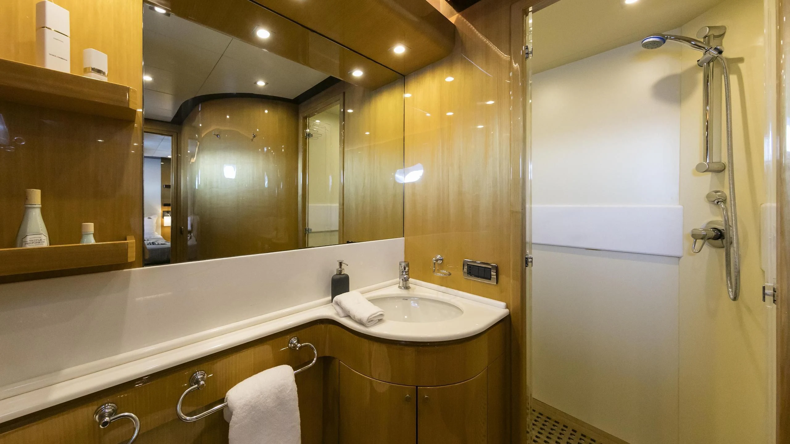 a bathroom with a large mirror aboard CAN'T REMEMBER Yacht for Sale