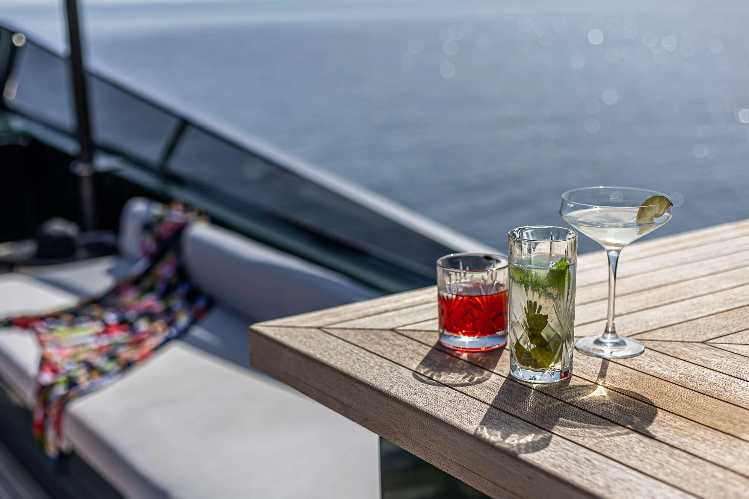a group of glasses with drinks on a table aboard CAN'T REMEMBER Yacht for Sale