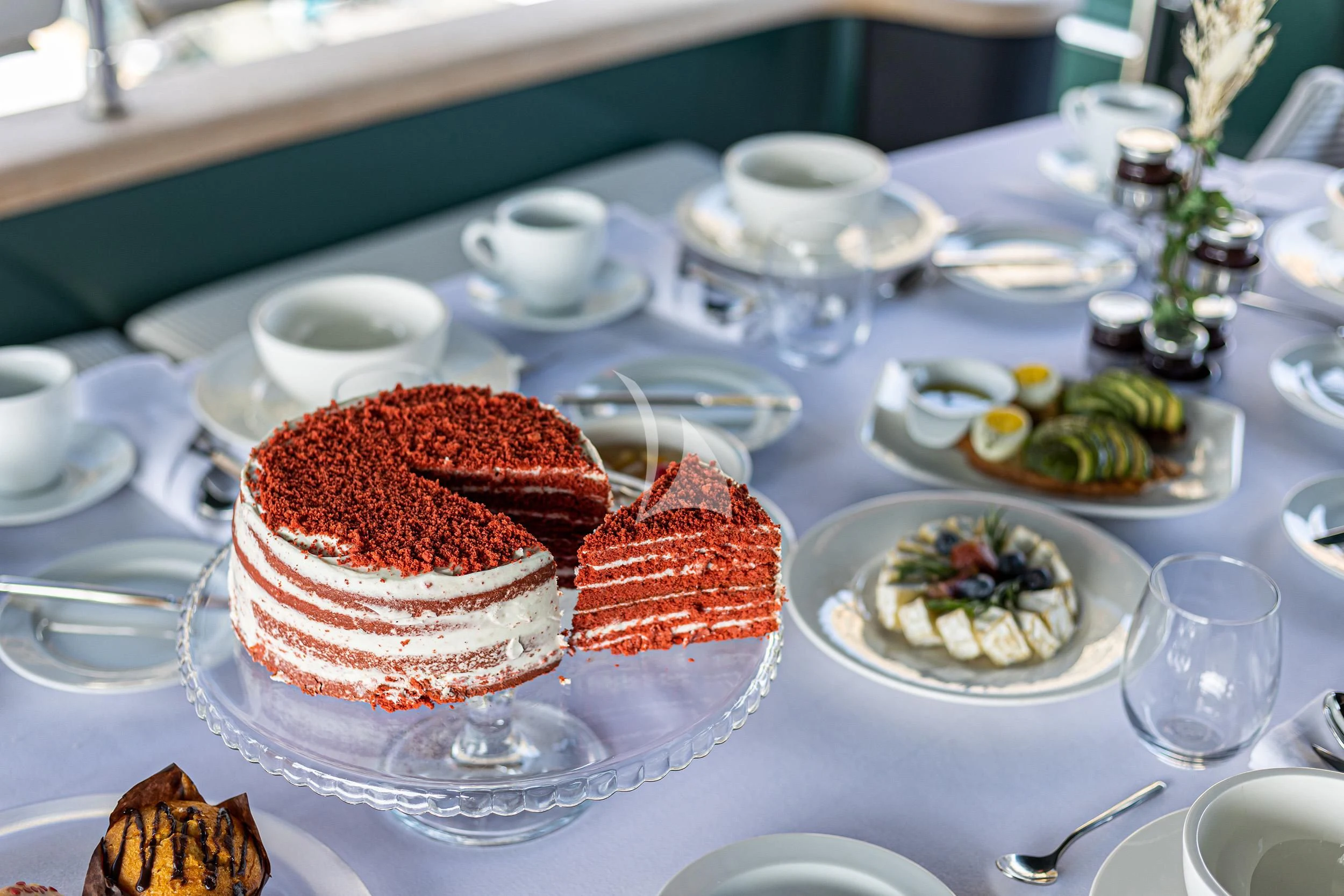 a table is filled with food aboard CAN'T REMEMBER Yacht for Sale