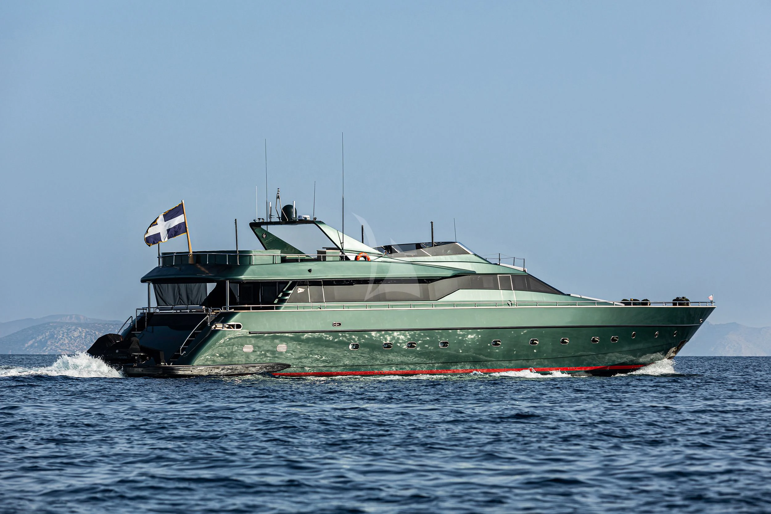a large green boat in the water aboard CAN'T REMEMBER Yacht for Sale