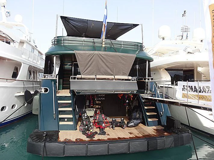 a boat with a large umbrella on it aboard CAN'T REMEMBER Yacht for Sale