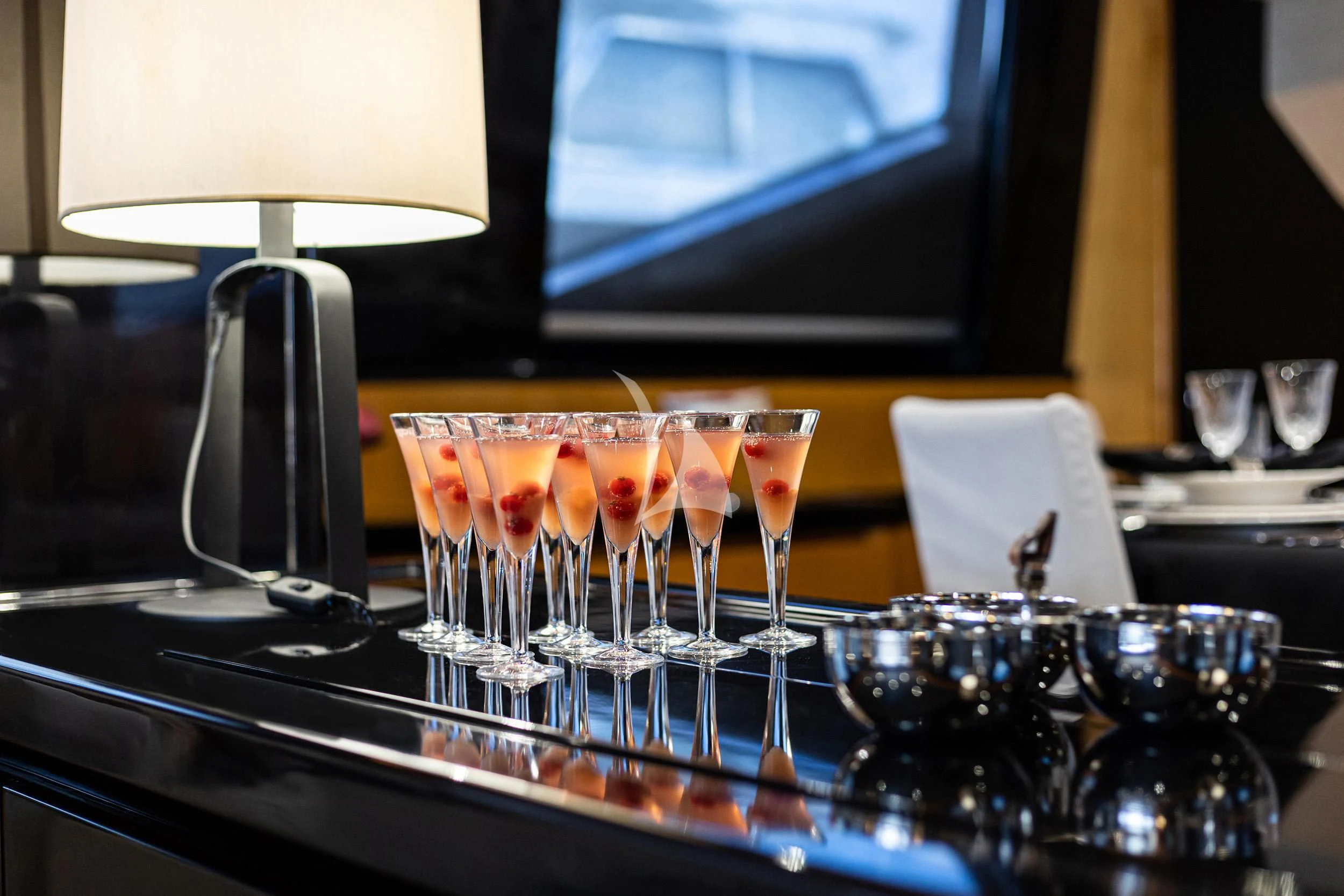a group of glasses with drinks on a table aboard CAN'T REMEMBER Yacht for Sale