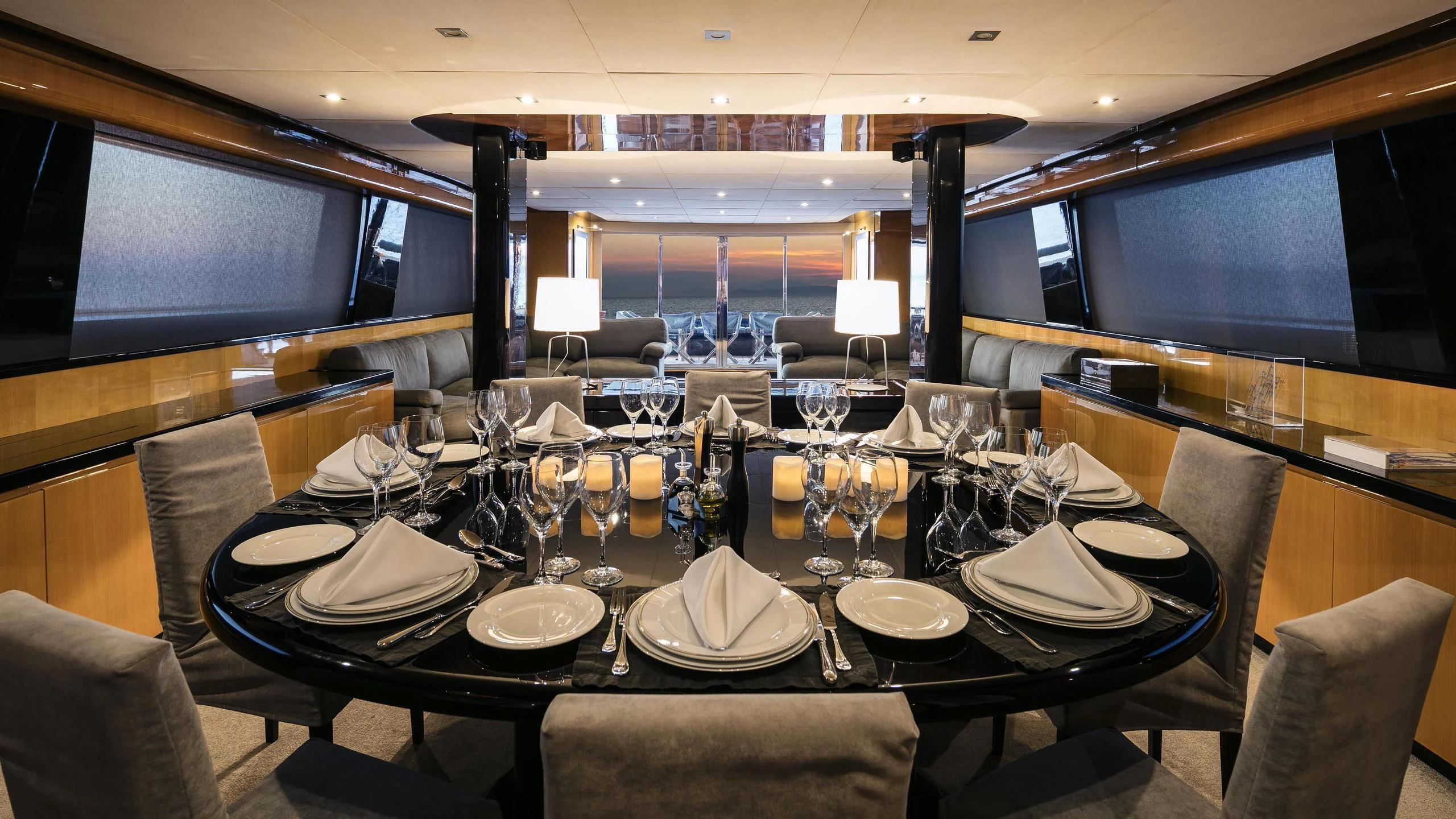a large table with plates and glasses aboard CAN'T REMEMBER Yacht for Sale