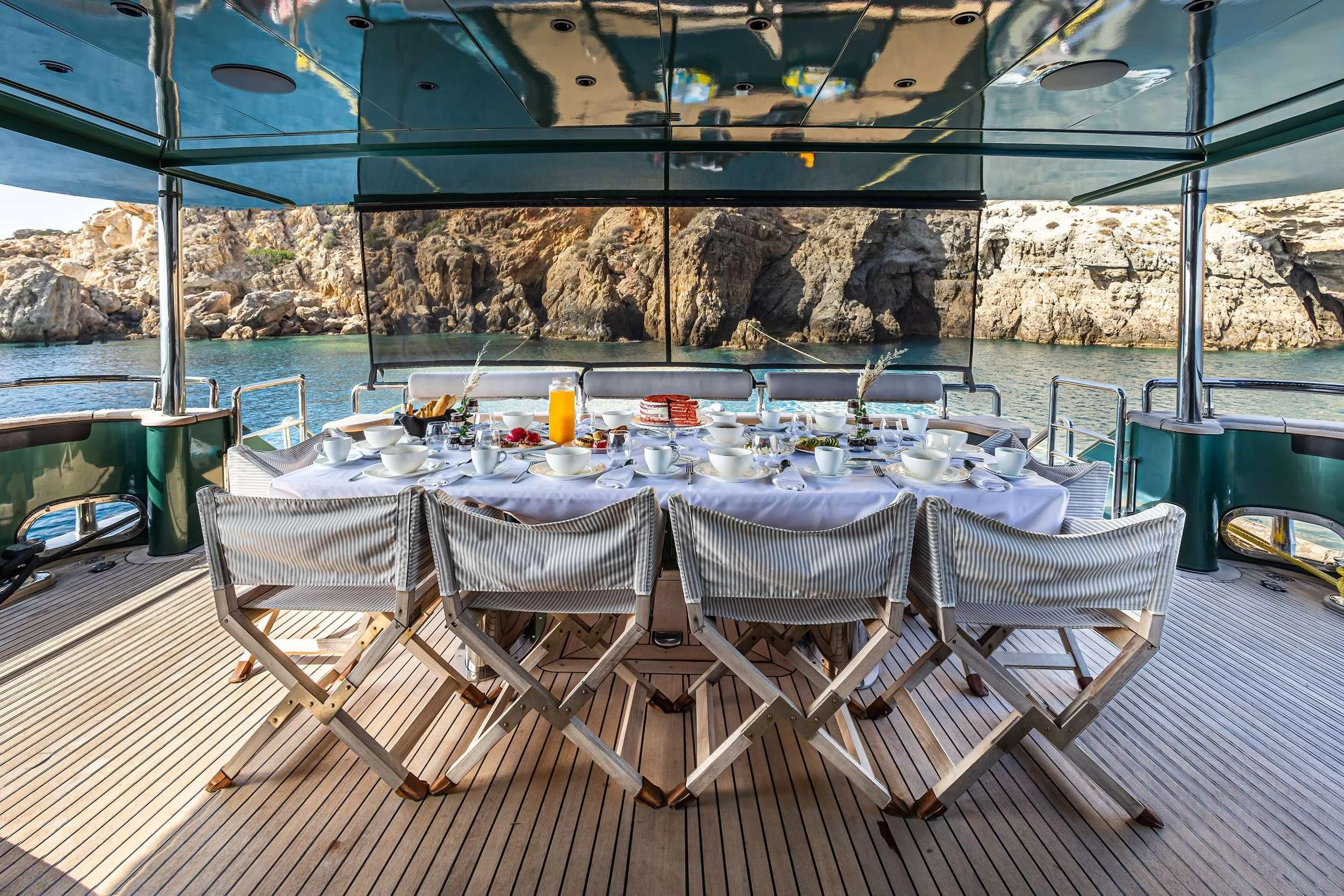 a table set up on a deck aboard CAN'T REMEMBER Yacht for Sale