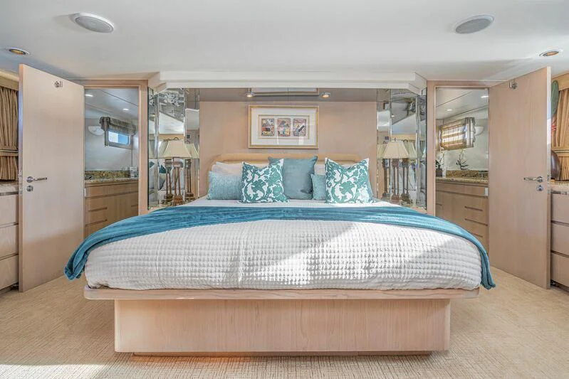 a bed in a room aboard PANACHE Yacht for Sale