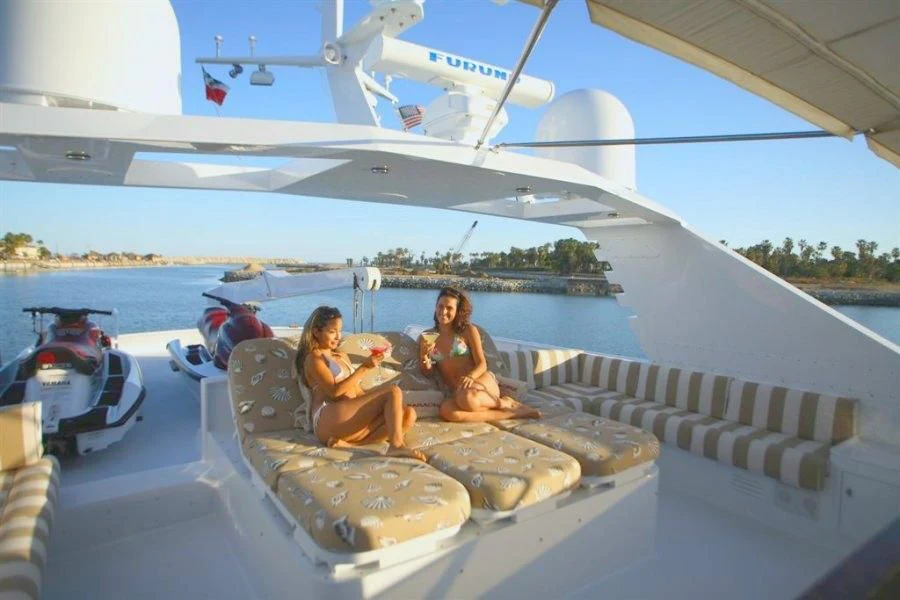 a group of people sitting on a boat aboard PANACHE Yacht for Sale