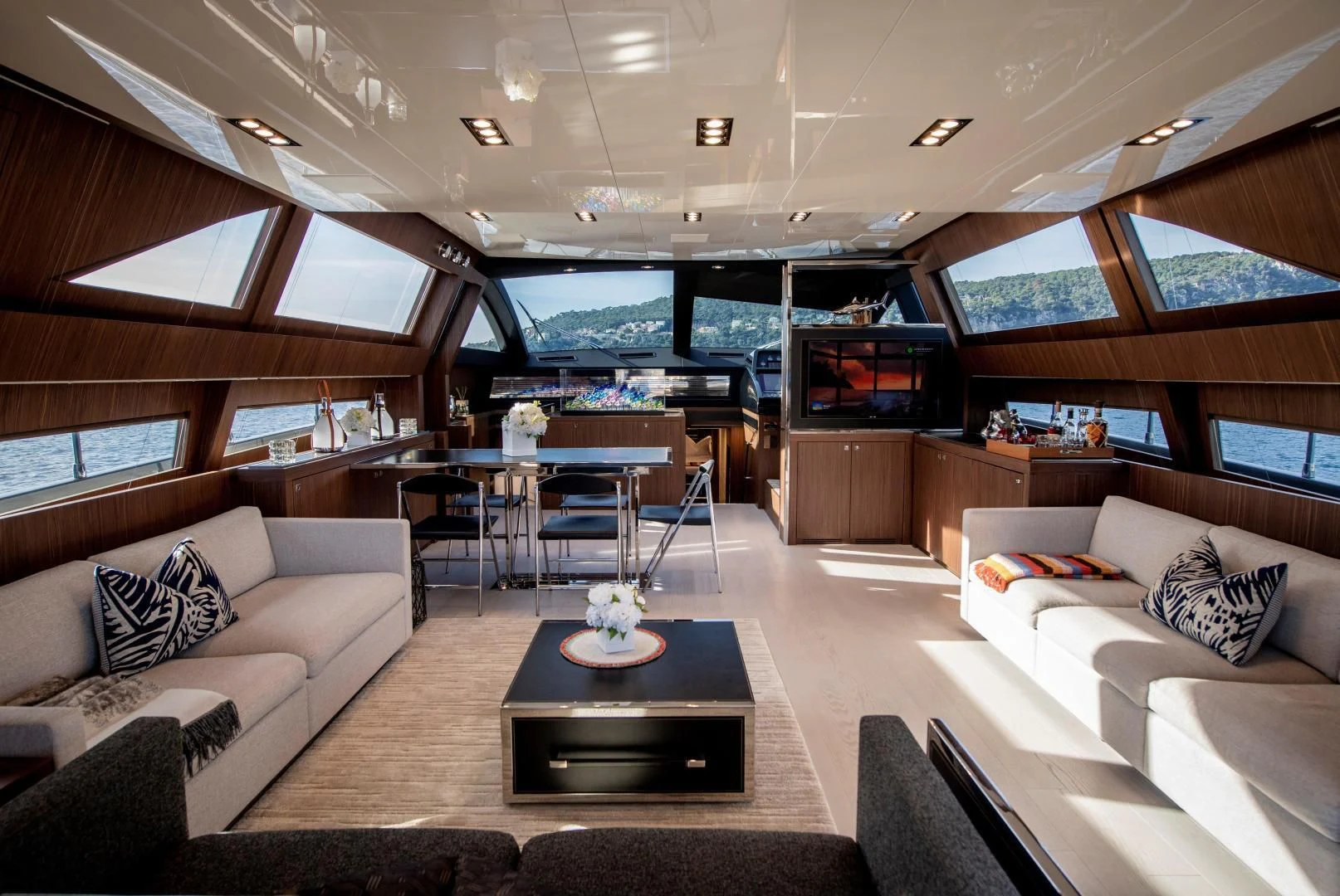 a living room with a large window aboard WILDONE Yacht for Sale