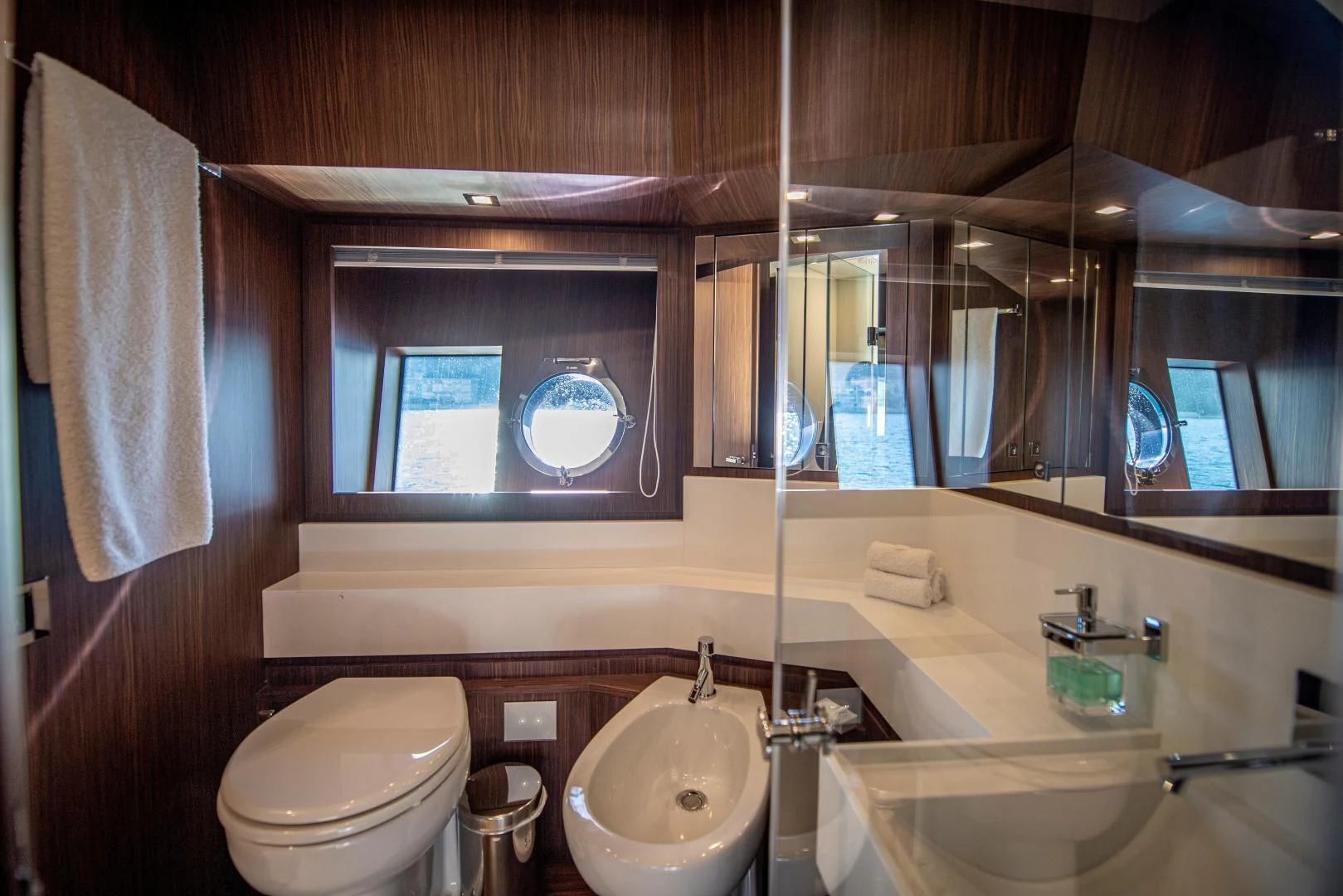 a bathroom with a sink toilet and a bathtub aboard WILDONE Yacht for Sale