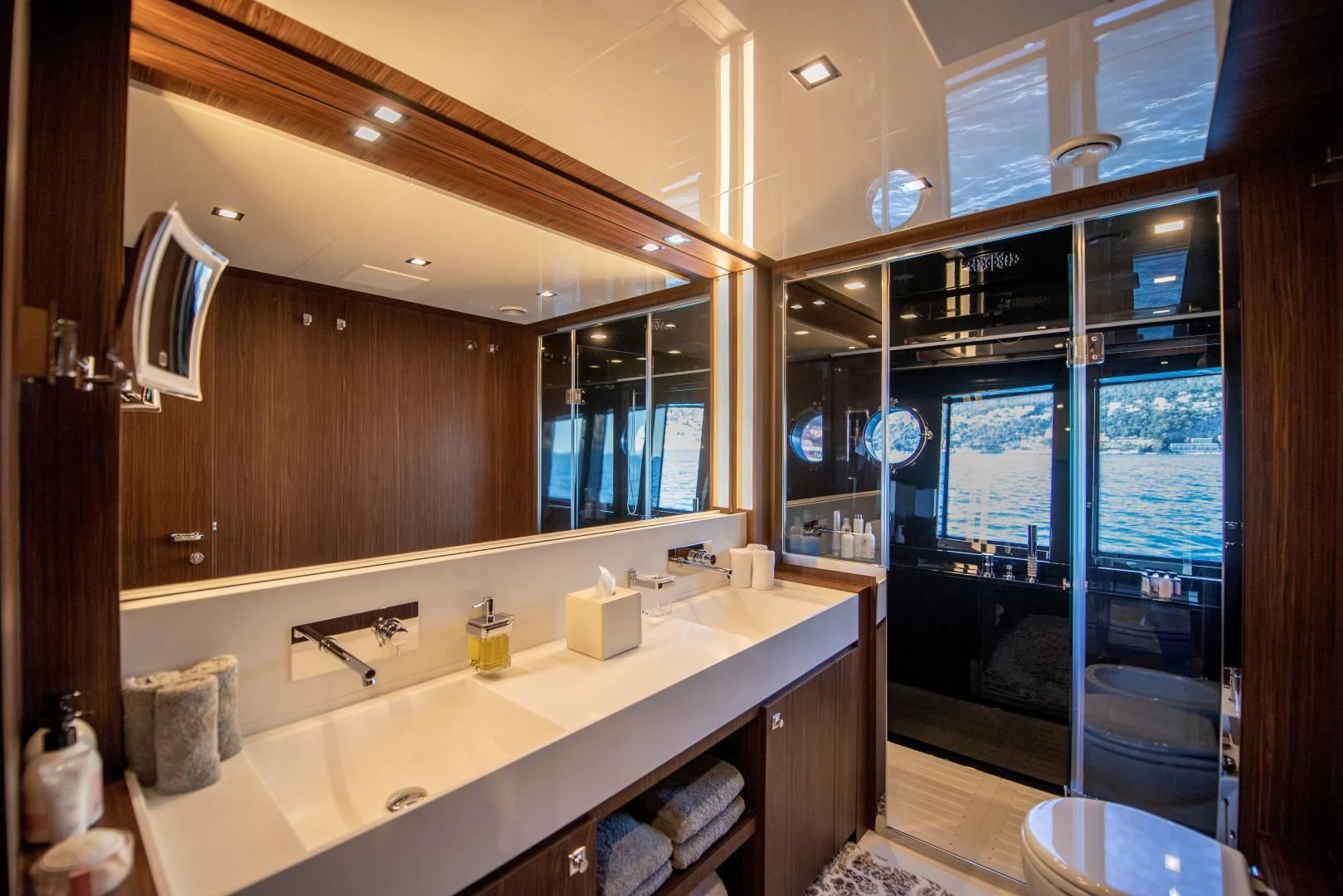 a bathroom with a large mirror aboard WILDONE Yacht for Sale
