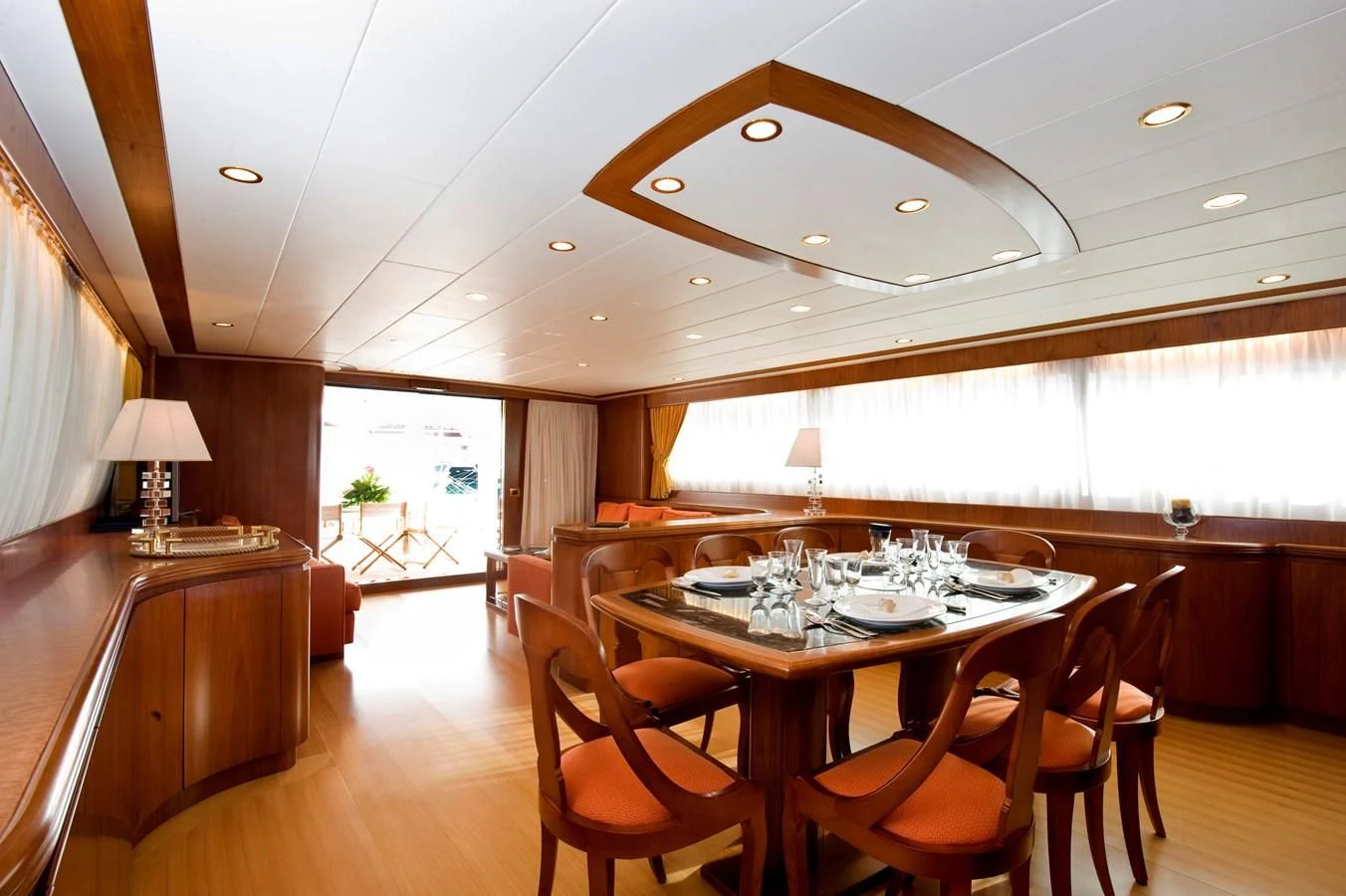 a dining room with a table and chairs aboard TOI MOI ET ROBY Yacht for Sale