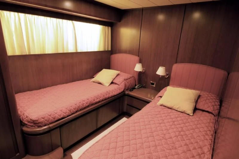 a couple of beds in a hotel room aboard TOI MOI ET ROBY Yacht for Sale