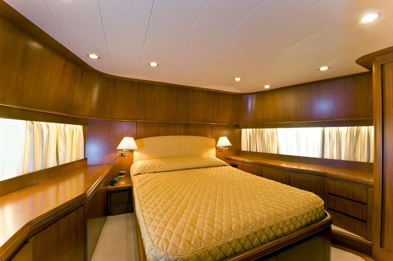 a room with a bed and a table aboard TOI MOI ET ROBY Yacht for Sale