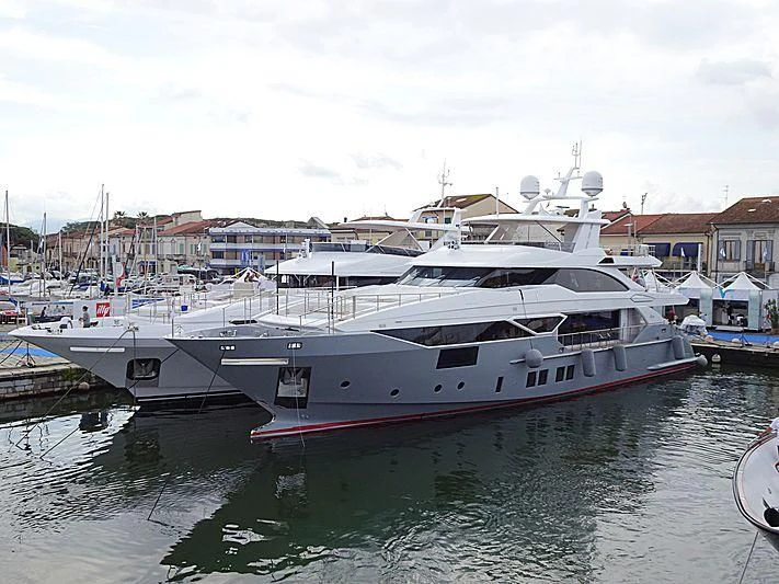 a group of boats are parked in a harbor aboard DELIBERATELY LUCKY Yacht for Sale