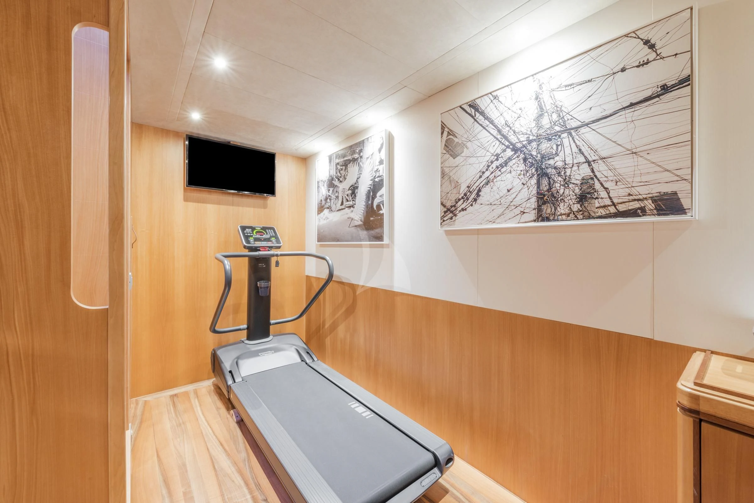 a room with a desk and a television aboard ANGRA TOO Yacht for Sale